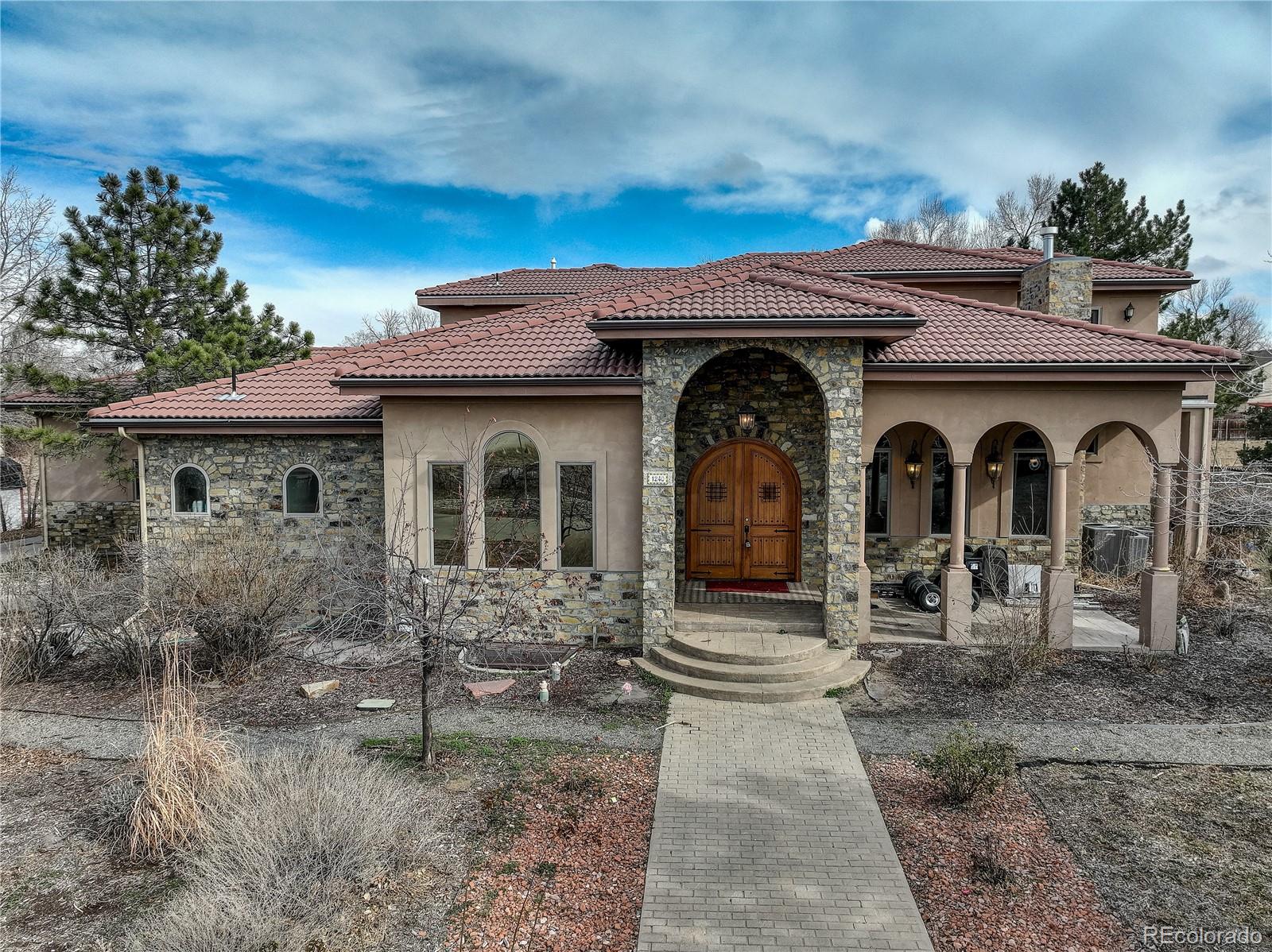 Welcome to 1240 S. Xenia, a well-appointed home featuring 7 bedrooms and 6 bathrooms, offering a functional layout ideal for everyday living and entertaining. The gourmet kitchen is thoughtfully designed with quality finishes and ample space for cooking and gathering. Professional stove and pasta arm make for a Chef's delight!!  Living area just outside of kitchen has soaring vaulted ceilings & dual-sided fireplace. ! Grand formal dining room w/fireplace, stone wall, spacious bedrooms provide comfort and flexibility, including a private primary retreat on the main floor, while the bathrooms are well distributed for convenience.The finished basement offers excellent versatility and can serve as a 3 bedroom rental or a income-producing Airbnb with its own entrance. Conveniently located near parks, shopping, dining, and major commuter routes, this home blends comfort, character, and accessibility. A dedicated wine room adds a unique and desirable touch, perfect for wine enthusiasts or as a distinctive bonus space. The 40,946 SqFt lot offers ample space for all your needs! Koi pond and chicken coop included! Home is zoned to allow two more homes on the property!! Well on property to aid in taking care of the grounds! Home offers plenty of space in the home and yard!!Homes is in CHERRY CREEK school district! City living with a touch of country feel! Make this custom deigned home yours!! OPEN HOUSE SATURDAY 3/7 from it might be Stephanie MeadowsOpen house Saturday, 3/7/26 from 11:00 am - 2:00 pm Open house Sunday, 3/8/26 from 11:00 am - 2:00 PM