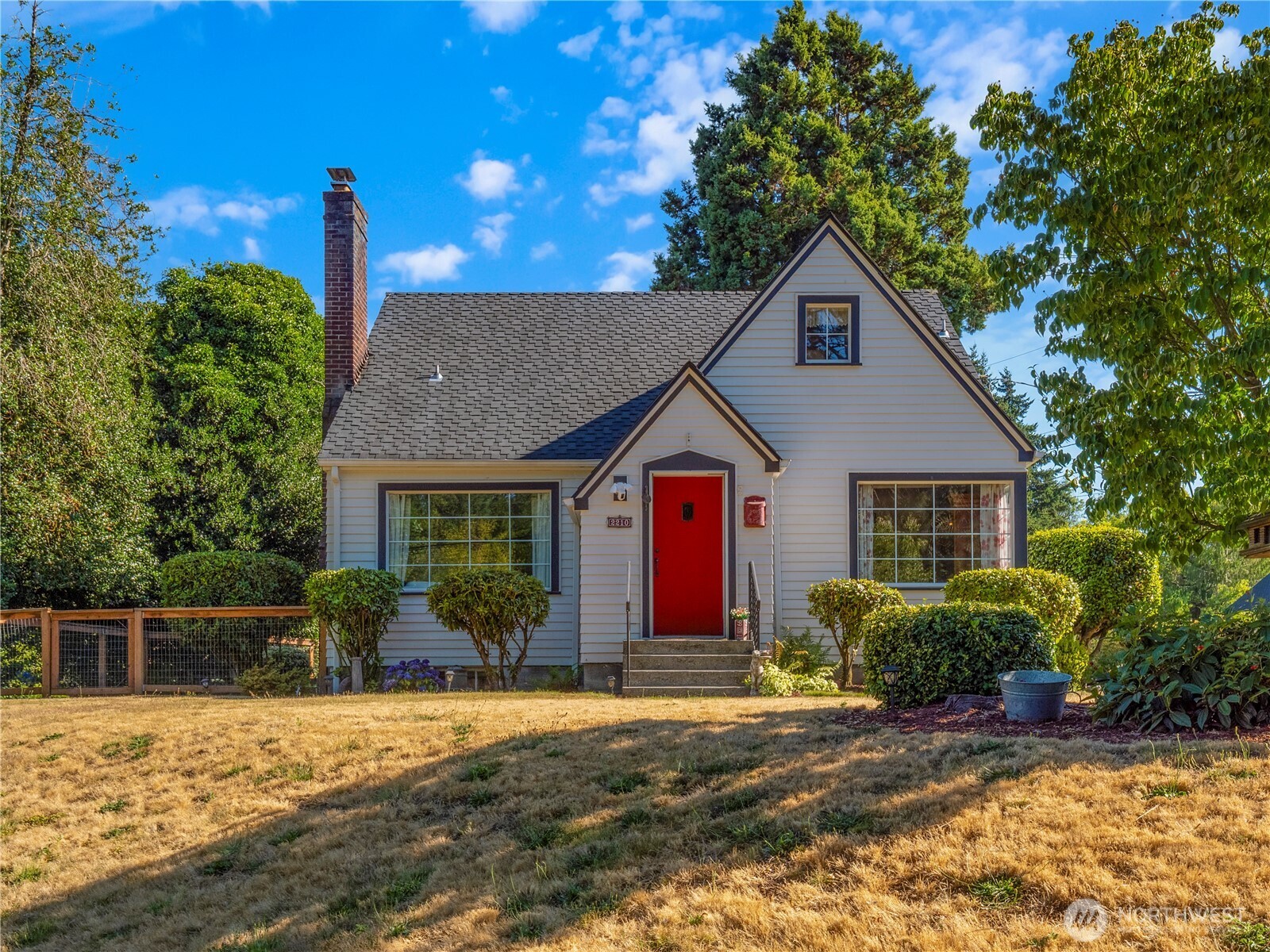 Classic home on the banks of Clark's Creek with peaceful, park-like setting just minutes from Downtown Puyallup's farmer's market, dining & shops. Home solidly built in 1939 featuring tray ceiling, curved archways, wood burning fireplace & hardwood floors. Kitchen fully remodeled with quality cabinets, butcher block counters & farmhouse sink. Sunlight fills the house through its large picture windows. Spacious primary bedroom with remodeled bathroom appointed with double vanity & enormous shower. 2nd full bathroom also newly remodeled with new tile, flooring & vanity. Beautiful grounds feature 262 ft of creekfront to enjoy fishing, watching wildlife, or kayak up to DeCoursey Park for a picnic. Minutes to Sounder Train & I-5. A Must See!