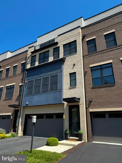 ** COMING SOON IN ONE OF BRAMBLETONS MOST SOUGHT AFTER NEIGHBORHOODS ** OUTSTANDING 4-LEVEL CONTEMPORARY LUXURY TOWNHOME ** 3400 SQUARE FEET OF LIVING SPACE ** ROOFTOP TERRACE ** TREX DECK ** FENCED BACKYARD WITH STUNNING PROFESSIONALLY INSTALLED PAVER PATIO ** THREE BEDROOMS - THREE FULL BATHROOMS AND TWO POWDER ROOMS ** UPGRADED WIDE-PLANK HARDWOOD FLOORS THROUGHOUT ** GORGEOUS GOURMET KITCHEN WITH OVERSIZED ISLAND - PENDANT LIGHTS AND BAR SEATING ** LIVING ROOM WITH LINEAR GAS FIREPLACE AND ACCESS TO TREX DECK ** DINING ROOM WITH TRANSOM WINDOWS AND CUSTOM CHANDELIER ** STAIRCASES  WITH CONTEMPORARY IRON RAILINGS **  BRAND NEW LG WASHER AND DRYER **  OVERSIZED FRONT LOAD TWO-CAR GARAGE WITH OPENER AND KEYPAD ** ALL THIS - AND A BEAUTIFUL COMMUNITY PARK WITH GAZEBO WHEN YOU STEP OUTSIDE ALONG WITH A DIRECT PATH TO BRAMBLETONS WALKING/JOGGING TRAILS MAKES THIS HOME A TRUE GEM ** PROFESSIONAL PICTURES WILL BE UPLOADED ON 5/23/26 ** OPEN HOUSE SATURDAY 5/30/26 1-3 PM **