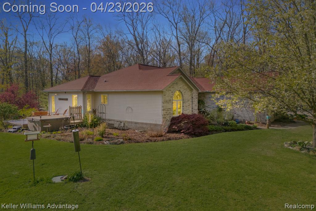 Welcome to your private retreat on 5 breathtaking acres—where tranquility, natural beauty, and thoughtful design come together to create a truly one-of-a-kind property. This exceptional walkout ranch is set on a picturesque parcel featuring a serene pond, mature trees, and lush, professionally maintained landscaping, offering stunning views in every direction.The home offers 4 bedrooms, including two spacious en-suites on the main level, ideal for comfort and convenience, along with two additional bedrooms in the walkout lower level—perfect for guests or multi-generational living. The beautifully updated kitchen showcases granite countertops, stainless steel appliances, and flows seamlessly into the expansive great room, where skylights fill the space with natural light and a cozy fireplace creates the perfect setting to relax and unwind. Step outside to the large deck and take in peaceful views of your private pond, or enjoy the added luxury of an outdoor shower just off the primary suite.The walkout lower level is designed for both relaxation and entertaining, featuring a cozy wood-burning fireplace, full bath, abundant storage, and flexible living space, along with plumbing already in place for a future lower-level laundry area.A standout feature of this property is the impressive barn (approximately 24 x 40), complete with electricity and endless potential. Whether you envision a workshop, studio, home office, or future guest suite or apartment on the upper level, this space is ready to bring your vision to life while adding incredible versatility and value.Additional highlights include beautifully curated landscaping, and new carpeting on the stairs leading to the lower level. Enjoy the peace and privacy of country living while still being conveniently located near shopping, dining, and major highways.This is a rare opportunity to own a stunning estate that perfectly blends indoor comfort with outdoor serenity—truly a must-see property.