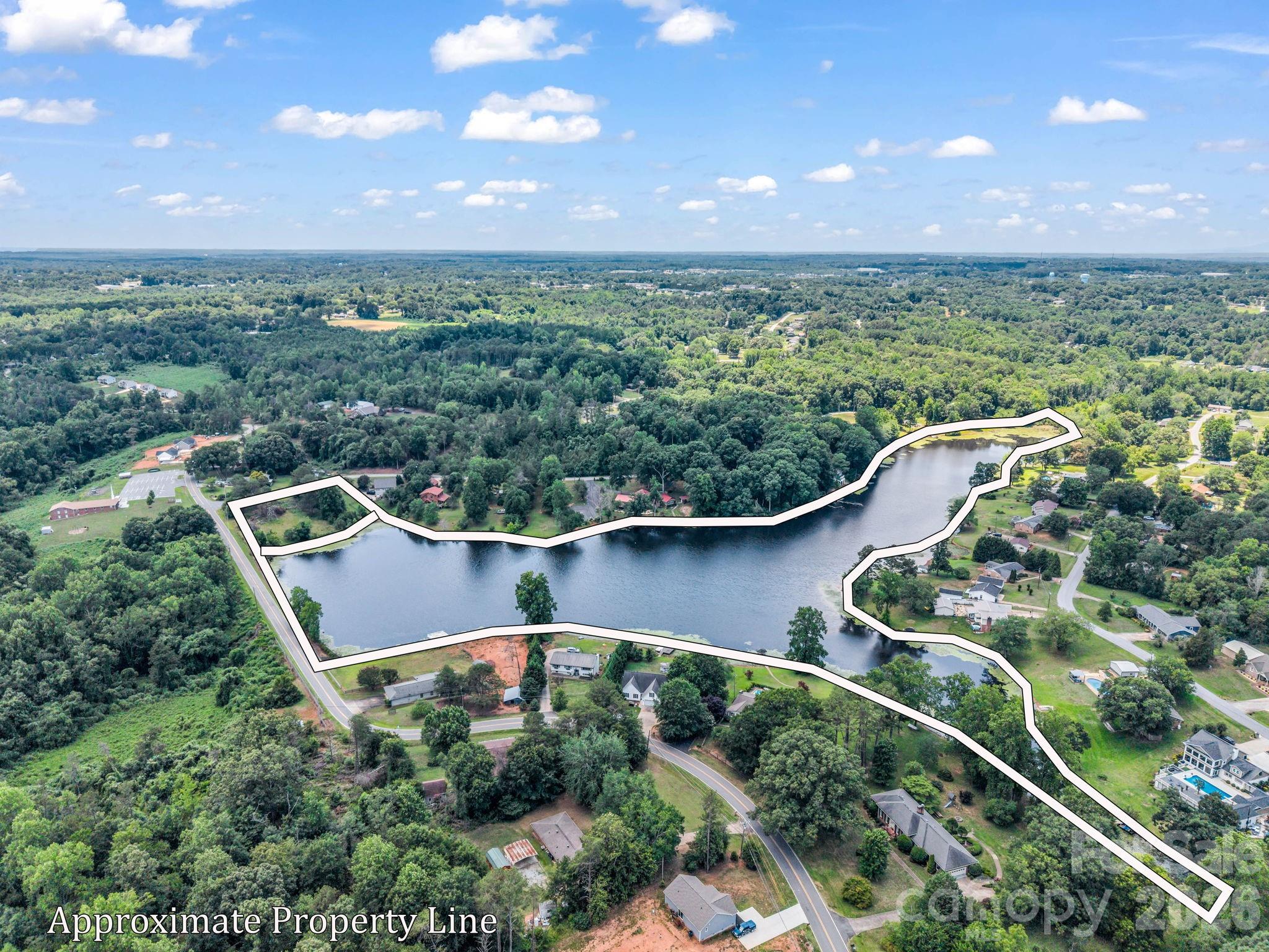 Rare Opportunity: Your Own Private 23-Acre Lake & Lakefront Lot! Escape to your own private oasis with this truly unparalleled property in Forest City, NC, offering an exceptional combination of acreage, privacy, and direct water access with an expansive, picturesque 23.51-acre lake paired with a beautiful 1.23-acre vacant lot. The buildable lot boasts a gentle slope leading directly to the water's edge, providing the perfect canvas for your dream waterfront estate, weekend cabin, or a peaceful retreat. Accessibility is already taken care of with an established on-site boat ramp, making it effortless to launch your boat, kayaks, or paddleboards from day one. Whether you are looking to create an exclusive private estate, a family compound, or a unique recreational haven, opportunities to own an entire lake are exceptionally rare, allowing you to enjoy the ultimate peace and tranquility of lakeside living while remaining within easy reach of local Forest City amenities—don’t miss your chance to own a piece of paradise! Contact agent for more information on the lake access and rules for the surrounding properties.
