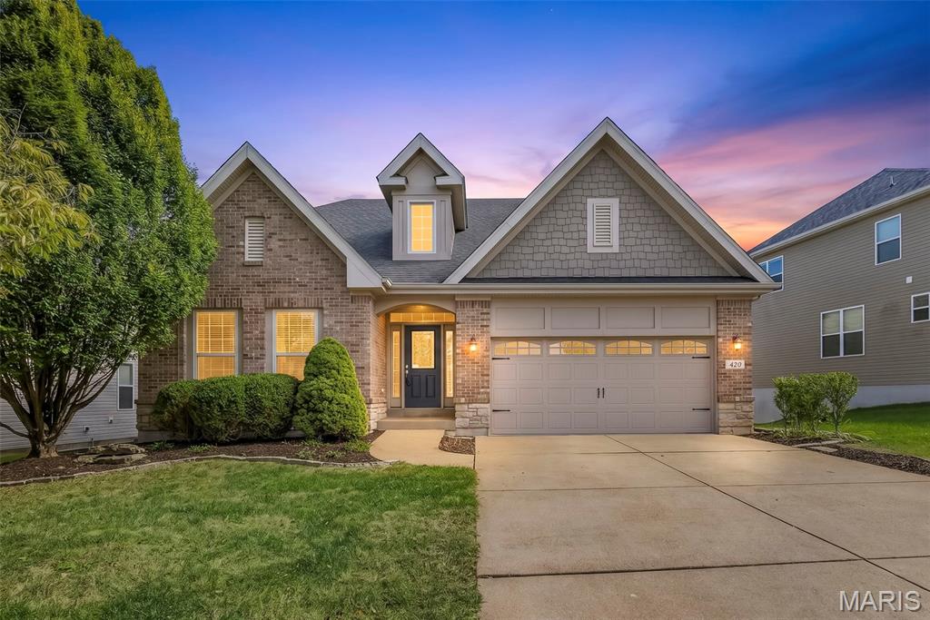 Welcome to 420 Maple Rise Path, a beautifully maintained ranch offering 4 bedrooms, 3.5 baths, with an exceptional  location in the heart of Chesterfield! Step inside to hickory hardwood flooring throughout, a private office with French doors, and a screened in deck overlooking the beautiful lot backing to walking trails.  The primary suite offers crown molding, a bay window, and a luxurious bathroom with tile flooring, dual vanities and a walk in shower. The finished walkout lower level significantly expands the living space with a massive recreation/family room, 4th bedroom and full bath, providing an ideal setup for guests or extended living. Major improvements include a NEW ROOF in 2026, NEW HVAC in 2025 and newer carpeting, offering added peace of mind. Ideally located in desirable Chesterfield, with convenient access to Central Park, Chesterfield Valley shopping and dining, trails, recreation and major highways. A rare opportunity for ranch living with a finished walkout, beautiful outdoor setting and an incredibly versatile floor plan!