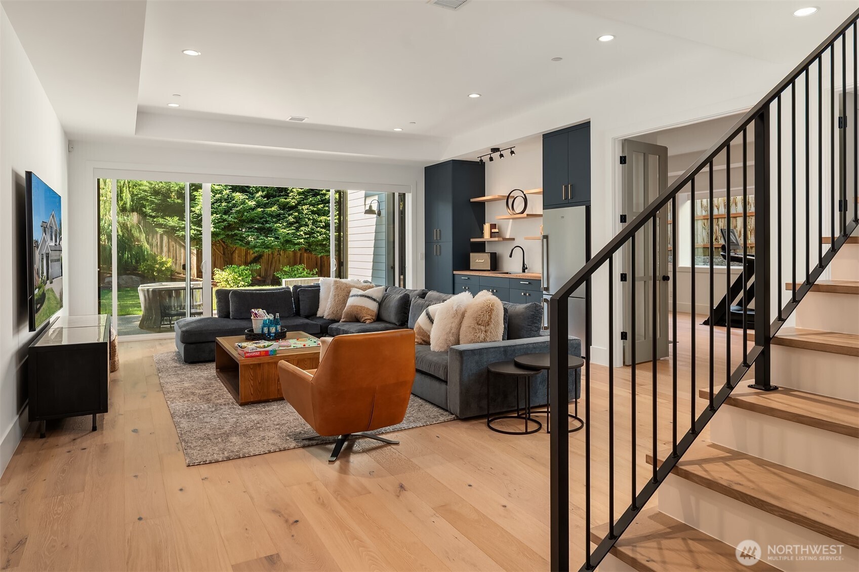 Media room with entertaining kitchenette/wet bar.