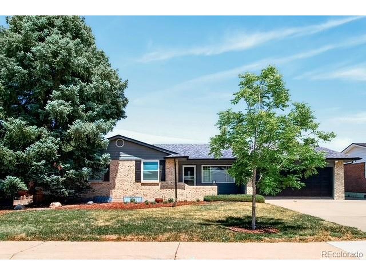 Welcome to this beautifully updated ranch offering easy one-level living plus a finished basement for extra space. This move-in-ready home features 3 bedrooms, 2 full baths, and a 2-car garage. Inside, enjoy gleaming hardwood floors, a cozy fireplace, and an open, light-filled layout. The updated kitchen boasts two-tone cabinetry, quartz counters  and stainless steel appliances, while both bathrooms have been tastefully renovated. The finished basement offers flexible living space and bedroom with new carpet (2025). The basement is stubbed plumbed.Outside, relax in the nicely sized backyard with a covered patio, backing to a peaceful greenbelt for extra privacy and open space. Enoy the central AC on a hot summer day.The home also backs to a peaceful greenbelt, offering extra privacy and open green space right outside your back door.Recent updates include: central A/C & heater (2024), roof & gutters (2024), basement egress window, patio door, and back door (2016), whole-house COPALUM remediation with lifetime warranty (2017), kitchen/bedroom windows (2022), and basement carpet (2025). Fiber internet available through Metrolink.Don't miss this move-in-ready gem in a wonderful Aurora neighborhood!