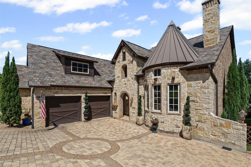 Located in one of Trophy Club's most desirable gated communities, this stunning custom home offers luxury, privacy and versatility. Thoughtfully designed and impeccably maintained, this home features spacious living areas, elegant finishes and an open layout perfect for entertaining and everyday living. The heart of the home is the gourmet kitchen, which flows seamlessly into the main living area and out to the private backyard. Upstairs, you'll find a separate guest suite above the garage - ideal for visitors or multi-generational living. With generous bedrooms, a spa-like primary suite and multiple flex spaces, there's room for everyone. Enjoy peace of mind and exclusivity in this secure neighborhood while still being just minutes from top rated Northwest ISD schools, parks, golf courses and dining. This is Trophy Club living at it's finest. Schedule your private showing today!