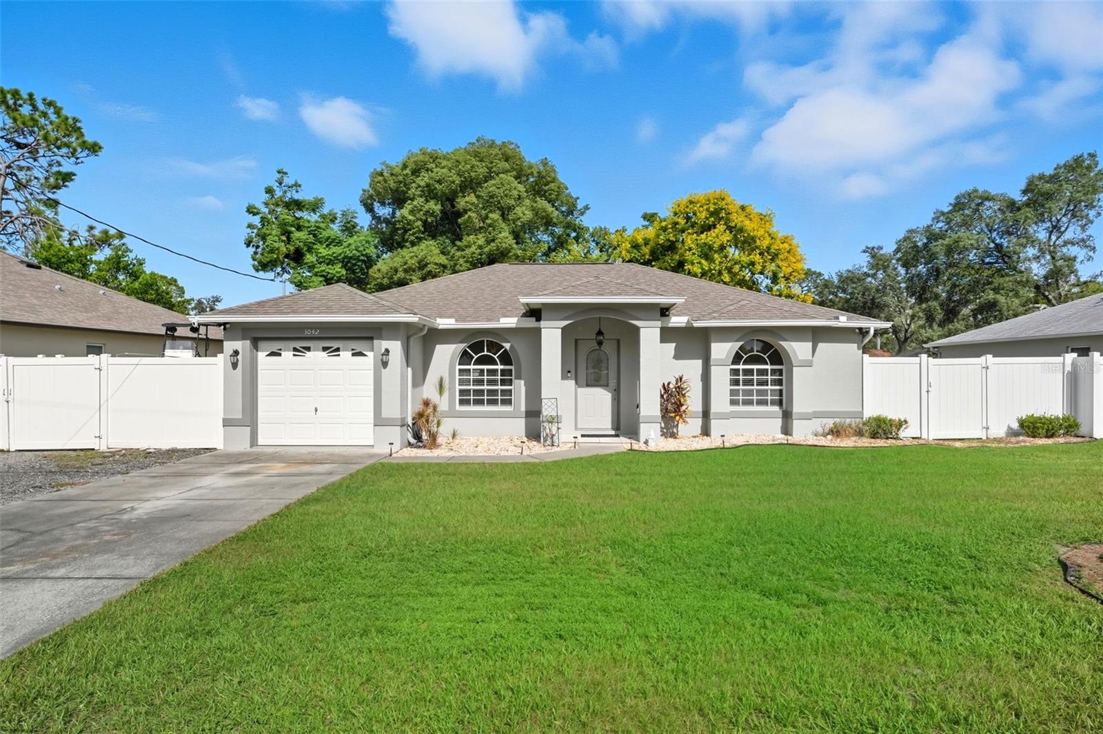 Beautifully maintained, move-in ready Single Family Home in the heart of Spring Hill, FL. Step inside to find a home that radiates warmth and serenity.  This delightful property features functionality and comfort in its 2 generously sized bedrooms and bathrooms in a versatile split floor plan. Relish in the private oasis of the fenced backyard. An expansive covered patio is accompanied by an inviting summer kitchen, ideal for hosting sun-soaked barbeques and outdoor events. The property further caters to relaxation and fun with an above-ground pool, perfect for the balmy Florida summer days. Accommodating outdoor enthusiasts, the home provides ample space for Boat and/or RV parking. Here, you shall find the leisurely pace and perks of Spring Hill living. Seize the opportunity to call this haven your home and secure your piece of Florida paradise.