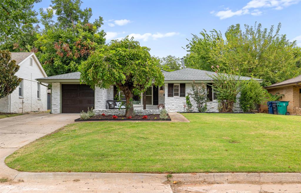 Welcome to this completely renovated home in the highly desirable Nichols Hills Heights addition. Enjoy all of the luxuries and the unbeatable location of Nichols Hills, but skip the property taxes! This home has been renovated from the ground up including all of the majors - brand new sewer line, roof, hardwood floors, and HVAC. The kitchen is complete with custom maple cabinets, high level quartz, and designer hardware.  The added laundry room and walk in pantry create an added convenience. The master suite is STUNNING with its own cozy fireplace and walk-in closet to make it a true luxury retreat! The en suite has an enormous walk-in shower, beautiful tile and quartz countertops, and custom-built vanity. The living room features a new electric fireplace and maple bookshelves. The house sits on an enormous lot that includes a back house that would be a great future pool house, gym, or home office. Don’t miss out on this opportunity - homes in the area under $400K don’t come around often! Call to schedule your private showing today!
