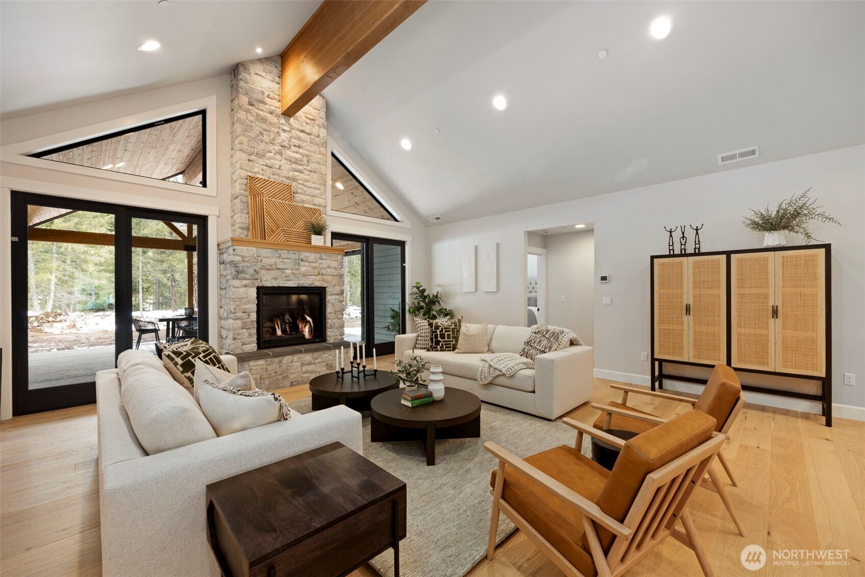 A welcoming entry opens to a wide, spacious corridor that draws you into the heart of the home, leading seamlessly to the kitchen and great room.