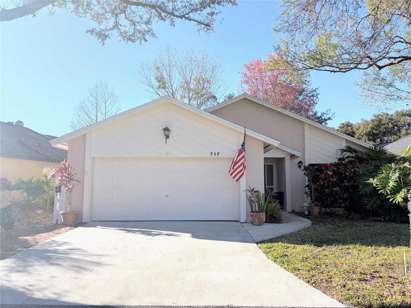Beautiful 2 bedroom 2 bath home on a pond! HOA maintains the lawn. Updated kitchen with granite counters and all appliances. Breakfast nook. Formal dining room. Large great room with fireplace. Both bedrooms have walk-in closets. Roof 2022. Huge Florida room in back with view of the pond. Enjoy relaxing in the backyard watching the ducks. Parks and playgrounds in neighborhood. Trotwood park has basketball and tennis courts and covered picnic area. Club house and tennis courts in neighborhood. Tuscawilla Country Club has golf, dining, swimming and tennis. Golf carts allowed in neighborhood. Close to Oviedo Mall, restaurants, and hospital. Near Seminole Trail for bike riding and walking. Good schools. Great location. Move right in! Must see!