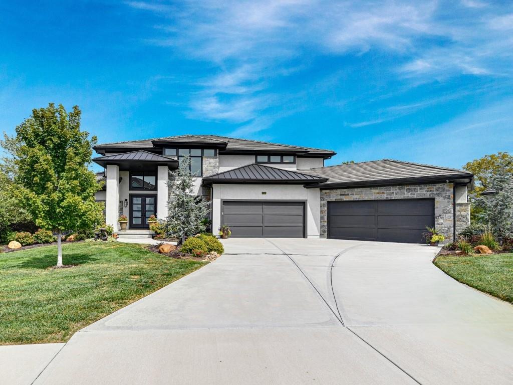 Get ready to fall in love with this gorgeous Don Julian Builders 2020 Artisan Tour winner! Tucked away on a quiet cul-de-sac, this Richmond floor plan is surrounded by treetops, giving you amazing privacy and stunning views. The upgrades throughout this home are impressive, making it perfect for anyone who loves to entertain. Step inside and you’ll find a spacious dining room divided from the open great room by a sleek tile fireplace. The great room flows into a chef’s kitchen with all the bells and whistles, plus an entertainment bar, a cozy breakfast room, and an incredible all-seasons sunroom. Picture yourself sipping coffee by the fire and enjoying those peaceful tree-lined views through the sunroom’s floor-to-ceiling windows. Head downstairs and the fun continues with a billiards and game area, a big bar for ultimate entertaining, and your own home theater—perfect for movie nights or catching the big game. Upstairs, features all new carpet, a bonus room for the kids to hang out, spacious bedrooms all with their own en suite bathrooms and a 2nd laundry room. Recently refinished hardwood floors and some fresh paint on the interior, front door and garage doors give it an fresh updated look! This home really has it all! Other prestigious accolades include: 2020 Pick of the Parade - Gold and 2020 Distinctive Plan and Design - First Place. Don’t miss the chance to own this one-of-a-kind home that’s ready to enjoy & entertain!
