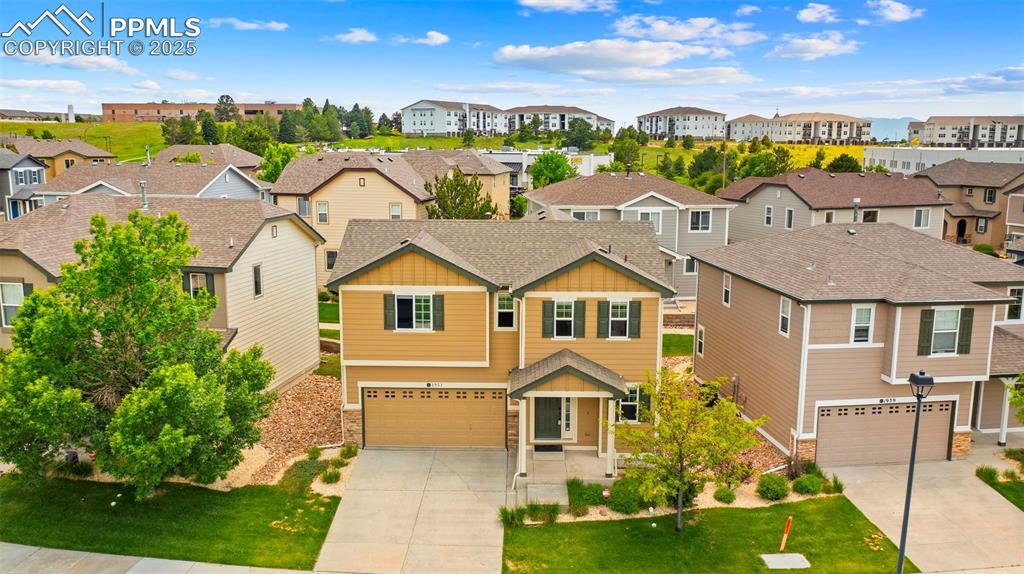 Stylish, Renovated & Move-In Ready! This beautifully kept 4-bedroom home offers a rare opportunity in a prime location—just a short walk to Interquest’s shopping, dining, and entertainment, with easy access to I-25 and located in highly desired School District 20. Step inside to a bright, open floor plan and a fully updated kitchen featuring granite countertops, bar seating, a Blanco sink with chef’s faucet and disposal, under-cabinet lighting, new electric range, microwave, dishwasher, and more! The spacious primary suite includes a large walk-in closet and a custom luxury bathroom. Upstairs, you’ll find 4 bedrooms, 2 baths, and a convenient laundry area. The private, zero-maintenance yard is perfect for relaxing or entertaining on the large covered patio—ideal for alfresco dining. The community offers extensive walking paths and HOA-covered yard maintenance (mowing, trimming, irrigation, and plantings) plus trash service—giving you low-maintenance living in a prime spot. Quick closing available—this one won't last!
