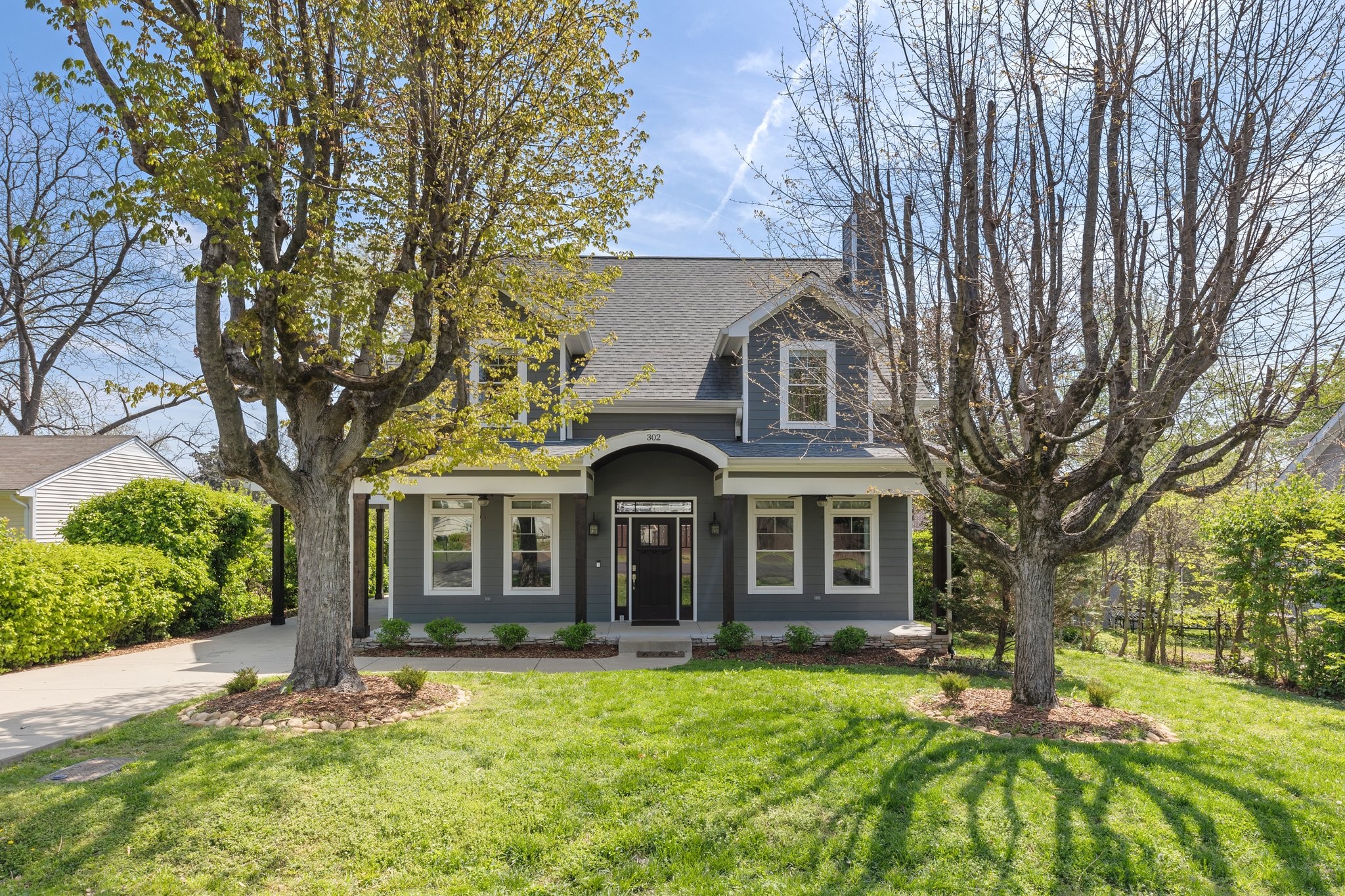 Beautiful craftsman style home in Downtown Franklin! Two bedrooms on the main floor. All solid surface floors on the main floor. Gas cooktop, double ovens, 2 pantries, 2 bonus rooms. City has approved converting carport to garage if buyer wished to have that done, and seller is willing to contract.