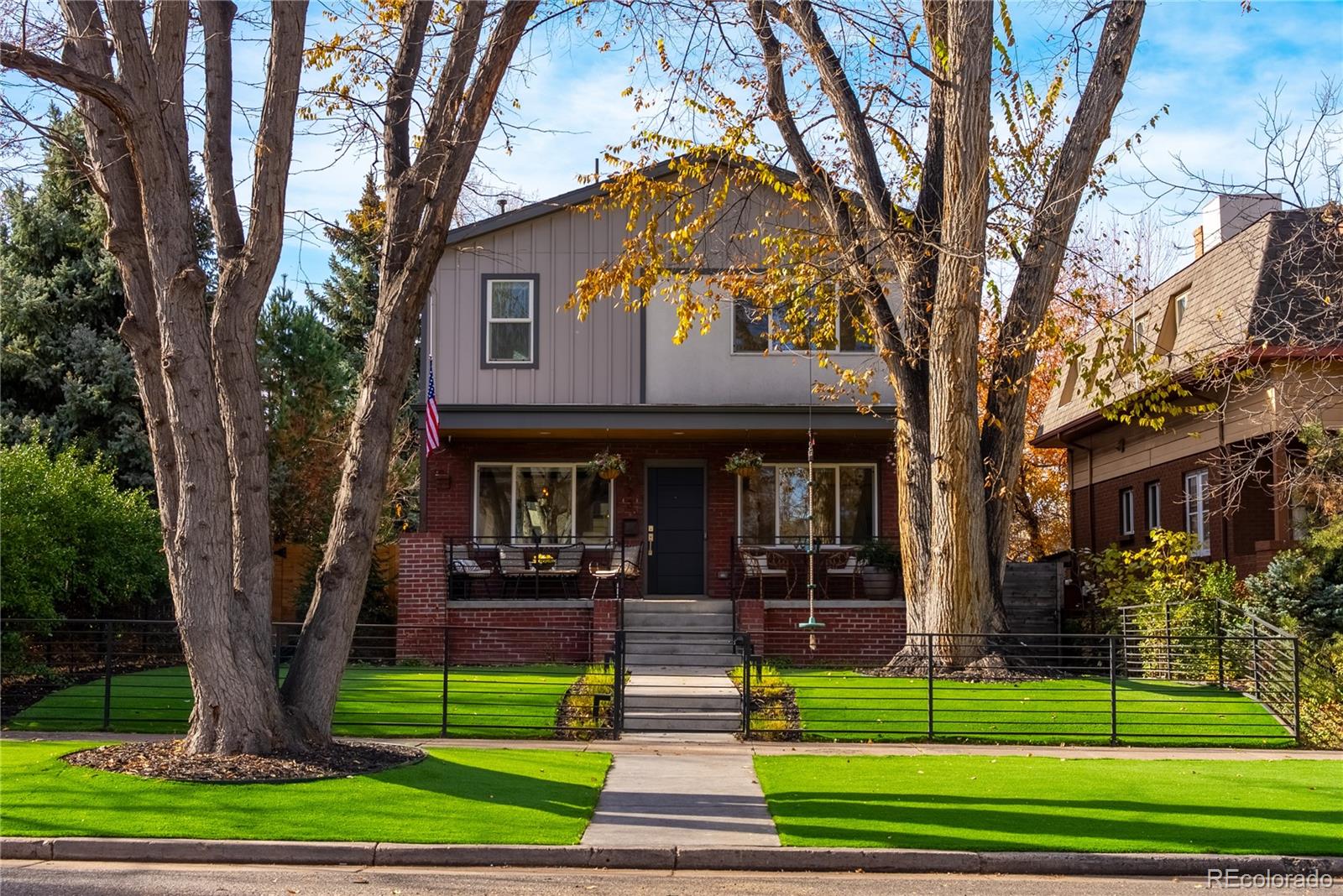 Experience luxurious living in this immaculate, modern 6-bedroom, 5-bath, 4,428 sq ft masterpiece, just four blocks from Denver University and one block from Observatory Park. This home boasts a breathtaking indoor/outdoor relationship: step out to a year-round covered patio with hot tub, cold plunge, putting green, and fire pit perfect for entertaining beneath Colorado skies. Inside, the open concept layout features newly refinished pristine hardwoods, oversized windows, and a stunning architectural staircase with mono-stringer and floated butcher block treads.

The gourmet kitchen impresses with sleek quartz countertops, an oversized island, walk-in pantry, and top-of-the-line appliances. Enjoy seamless living and entertaining in spacious dining and living areas with a contemporary fireplace. The private primary suite offers a spa-like five-piece bath complete with an artistic soaking tub and glass shower plus a generous walk-in closet with custom shelving. Each additional bedroom is inviting, with ensuite baths and ample closet space.

A finished lower level provides a large rec room, wet bar, and flexible gym or media space. Energy efficient upgrades, smart home tech, and flawless high speed internet support modern living. The three-car garage features custom organization systems, perfect for storage or hobbies.

Outdoors, privacy and serenity abound, with lush landscaping and space for play, pets, or peaceful relaxation. Live steps from Observatory Park’s scenic paths and Denver University’s vibrant offerings, with quick access to shopping, dining, and top schools in a sought after, tree-lined neighborhood. This move-in ready, pristine home is the epitome of upgraded, luxurious Denver living remarkable design, comfort, and convenience await.