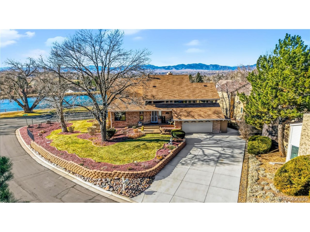 LOCATION LOCATION. When you buy in the Ranch your buying into a lifestyle. LOCATED in the private sought out golf course community, one of few homes with a 2 car heated garage room to fit a golf cart hut. Beautiful mountain, pond views from the front located on .33 acres in a quiet secluded location! Home has many new high finishes and upgrades. New hard wood floors on upper level top and newly refinished floors in dining room and living room to match hardwood floors throughout home.  Kitchen offers high-end Miele stainless kitchen appliances, new countertops and backsplash with a spacious island that allows for additional seating space, with custom cherry and maple soft close cabinets. Formal living room, dining room and great room are all located on main level along with a heated sun room.  New light fixtures throughout the house and new outdoor lights. New interior paint on entire house, newly remodeled powder bath with  vanity, sink, faucet, fixtures and tile. Primary master ensuite is oversized with a  connecting private sitting area for relaxing/workspace/TV area with a Luxurious custom oversized walk in closet with a custom built Island offering additional drawer and storage space with a 5-piece primary bathroom has new decorative vanity mirrors, faucets, light fixtures, with a luxury tub for relaxing, walk shower with heated tile floors. The spacious laundry room new counter tops, sink, faucet and backsplash. The finished basement has new texture, paint and smoothed ceilings, and a large recreation room in addition to a separate area that can be used for a home office/exercise room. New furnace as of February 24th with 10 yr transferrable warranty. Back yard is private and oversized. Home is waking distance to the private Ranch Country Club, with a membership amenities to golf, tennis, social activities, fitness center year round. Property close to open space, walking trail, restaurants, shopping and easy highway access. Move in ready!