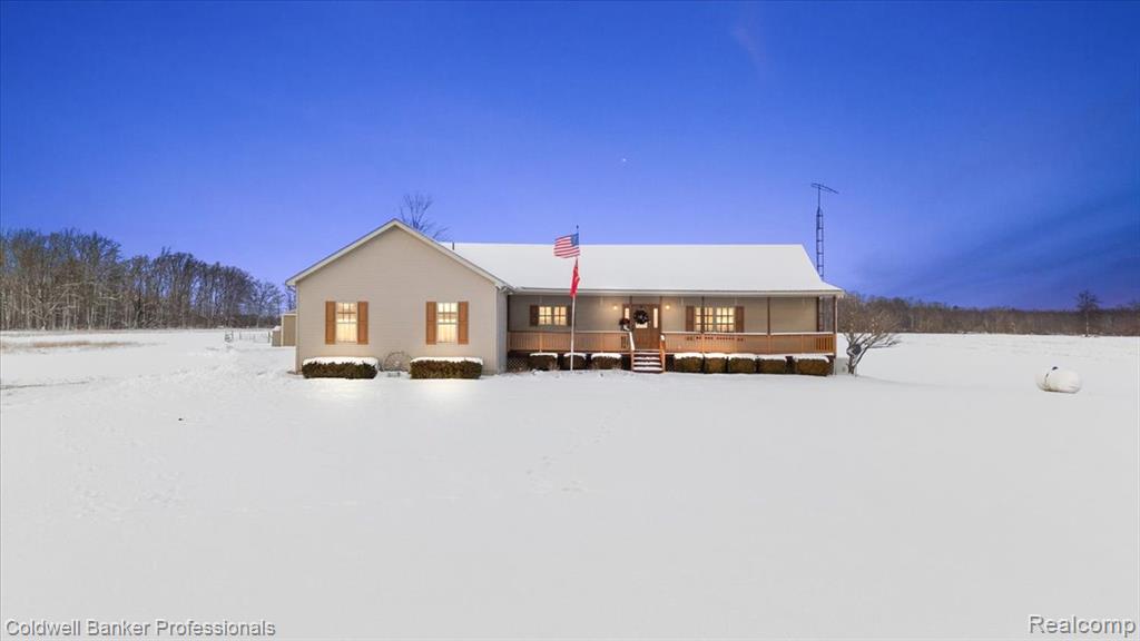 Experience the best of country living on this picturesque 20-acre hobby farm. This ranch was designed for comfort, and an equestrian lifestyle. Horse lovers will appreciate the 30x60 pole barn, complete with 3 stalls, water access, a heated 9x10 tack room, along with a 60x60 indoor riding arena for year-round training. There's an electric fence pasture, a pond, 220 service with a 30 amp RV hook-up outlet. In the ranch style home, you'll find new flooring, a gas fireplace in the living room. The large kitchen is fully stocked with all appliances included. The primary suite feels like a private spa, with a soaking tub, a separate shower, a new closet organization system. A dedicated office space allows you the opportunity to work from home, and the sellers are including the beautiful bookshelves, as well as the new washer and dryer, and the chest freezer in the basement. The family room in the basement offers an additional gathering spot, and it has a pellet stove for those chilly nights. There is a new water heater tank, sump pump, and a water softener. And the sellers are also including the security system. This gem is even equipped with a whole house generator. Enjoy peaceful mornings on your front porch sipping your coffee, and afternoons on your back deck grilling. The property has an abundance of wildlife (think herds of deer) and there is a small wooded portion that would be perfect spot for a blind. This property invites you to slow down, stretch out, and savor the lifestyle you have been dreaming of. Subject to the township approval of joining the following parcel ID's 00902401101 & 00902401100. Seller willing to sell some personal items if interested.