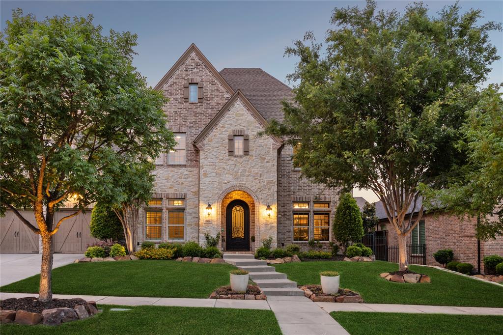 Situated on an expansive +0.2-acre lot in highly sought-after Lawler Park, this beautifully appointed traditional home offers over 4,200 square feet of gracious living across two levels. From the moment you enter the grand double-height foyer with its sweeping staircase, you'll be impressed by the home's timeless elegance and thoughtful design.  The main floor features a formal study with built-in work space and a paneled dining room, leading into a spacious living area with soaring beamed ceilings and a striking fireplace. The chef’s island kitchen is a dream, boasting stainless steel appliances, custom cabinetry, and generous counter space. A charming morning room with built-ins and its own fireplace is perfect for casual meals or a quiet coffee.  The luxurious primary suite offers a spa-inspired bath and a custom-designed closet with direct access to the utility room for added convenience. A second bedroom with en suite bath and walk-in closet is also located on the main level—ideal for guests or young children.
Upstairs, you'll find two additional bedrooms with private en suites, a large game room, separate media room, and a convenient powder bath.  The oversized 3-car garage includes custom storage and epoxy flooring. Step outside to your private backyard oasis featuring a large covered outdoor living space with fireplace, a custom pool and spa with water features, a turfed play area, and lush, mature landscaping for ultimate privacy.  This stunning home features over $220k in post purchase upgrades clearly placing it in a league of it's own.  Enjoy award-winning Frisco ISD schools and easy access to both Highway 121 and the Dallas North Tollway. This is luxury living at its finest in one of the area's most desirable communities.