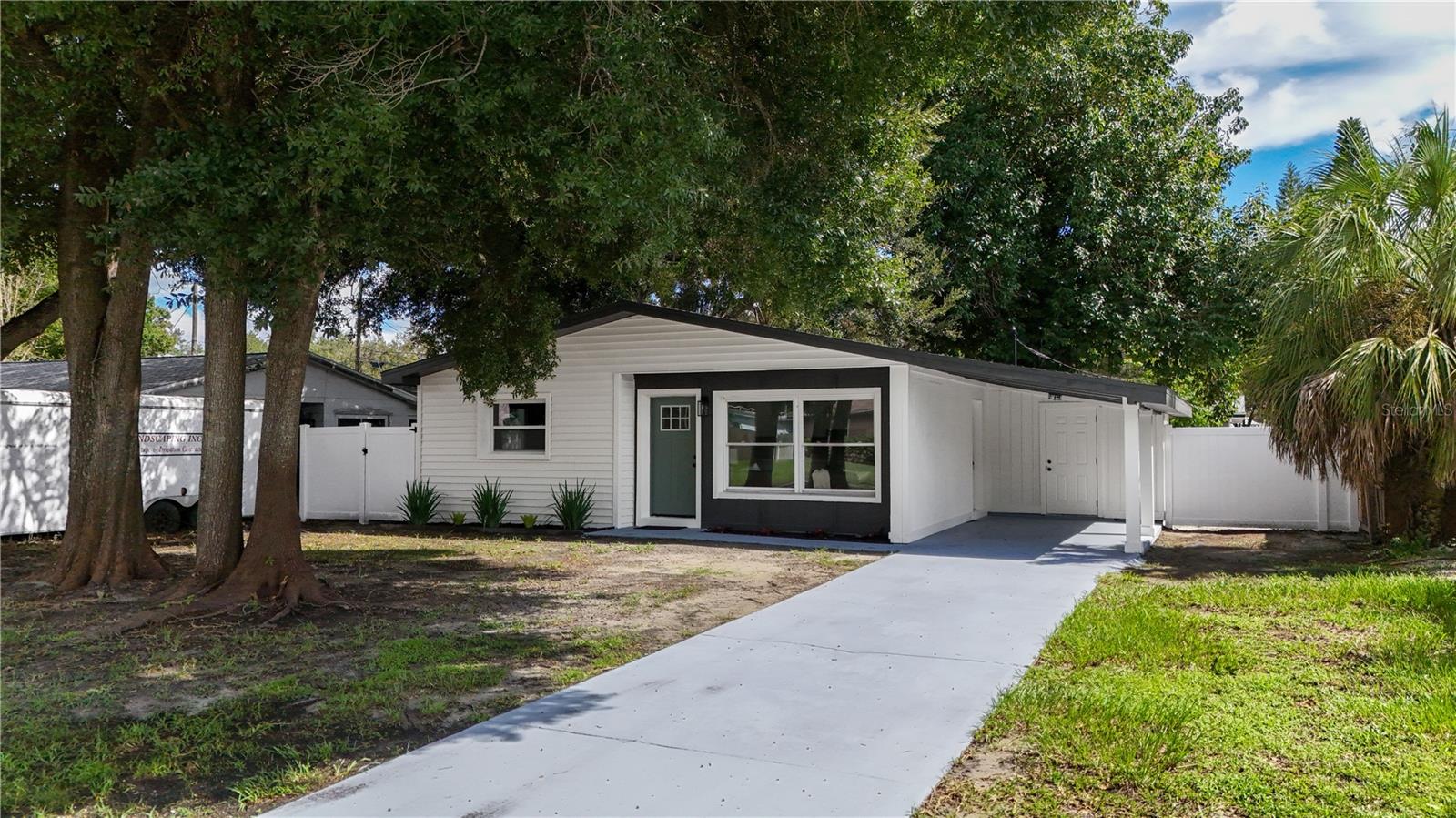Completely renovated from top to bottom, this Pinellas Park home is fresh, clean, and truly move-in ready! This 2-bedroom, 1-bath home features new LVP flooring, lighting, fixtures, fresh paint, a beautifully renovated kitchen and a completely updated bathroom. The open kitchen flows directly into the living area and offers custom cabinetry, stone countertops, recessed lighting, stainless steel appliances and a peninsula with bar seating. An inside laundry room adds everyday convenience, while the large fenced backyard provides plenty of room to relax, entertain or let the dogs run. A covered carport completes the package. The location puts you close to local favorites including Freedom Lake Park, England Brothers Park, Broderick Park, Park Place shopping and dining, and the Tampa Bay Automobile Museum, with easy access to St. Pete, Clearwater, and area beaches. There’s nothing left to do but move in, schedule your showing today!