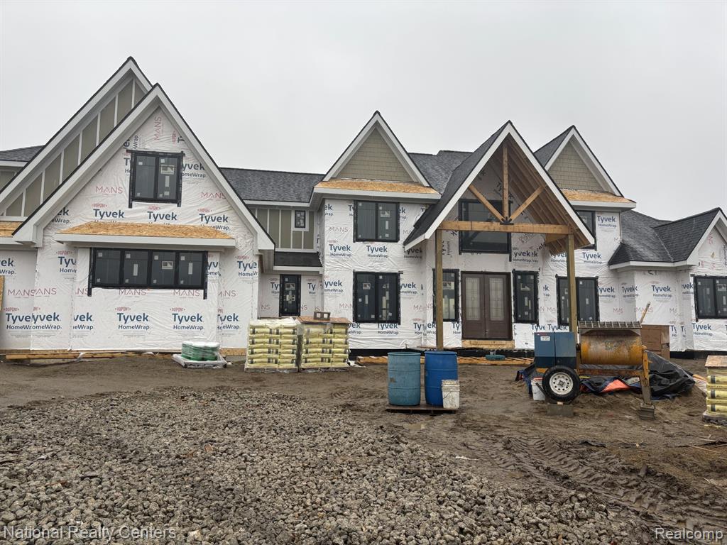 Lake living at its finest! Relax at home in this entertainers delight. Home is underway but still time to choose some finishings of your choice. Stunning elevation with brick and stone all around. Enter home from circular driveway to soaring 2 story ceilings leading to great room with gleaming hardwood floors and gorgeous views of Morgan Lake through wall of Anderson windows, cozy gas fireplace flanked by cabinets. Chefs kitchen with beautiful two toned cabinets, quartz countertops and island, plus walk in pantry and more lake views.  Organized entry from garage leads to laundry and powder room. Primary bedroom has stunning lake views, 10' step ceiling, His and Hers walk in closets and primary bath with walk in shower and soaking tub. Upstairs has additional 3 bedrooms plus 2nd laundry and huge finished bonus room. (Could be additional bedroom or game room)Walk out basement is prepped for kitchen and bath, ready for your vision. Home is prepped for Hi speed cable, & wifi, two furnaces, all up grade material throughout.  Must see to appreciate. Hurry as this will not be available long.