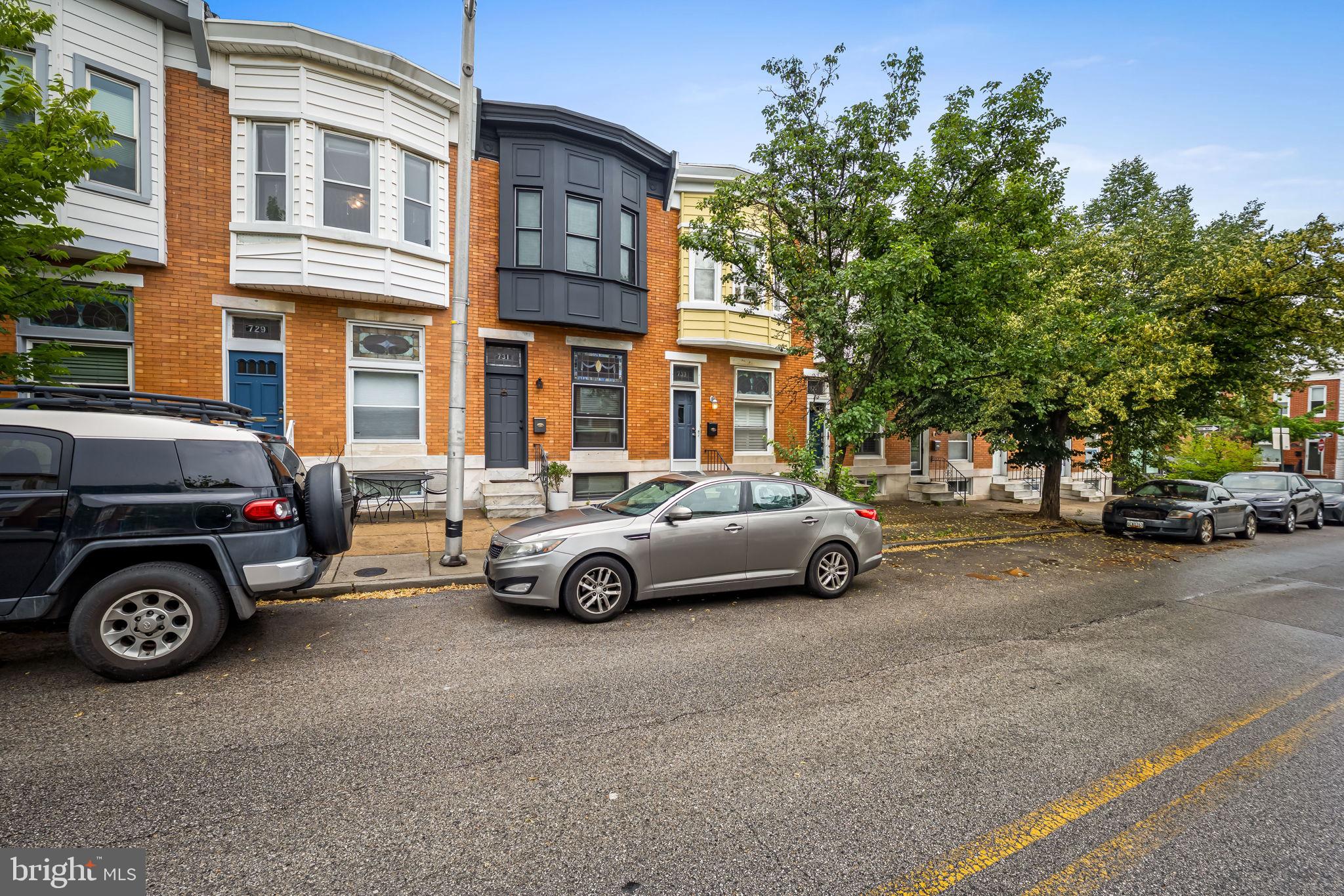 Welcome to 731 S Linwood, a stunning renovated CHAP home with an OFF STREET PARKING PAD in the Heart of Canton with approximately 2 years of a CHAP tax credit remaining. Step inside and you will be so impressed with all the details and extras throughout from the incredible fixtures, perfectly repointed brick walls, tray and coffered ceilings, and more. a spacious open floor plan boasting a gourmet kitchen and convenient half bath, perfect for modern living and entertaining.Upstairs, you'll find two bedrooms and two baths, including a luxurious master suite offering comfort and relaxation with access to the two tiered roof top deck. Enjoy breathtaking city views from the rooftop deck, an ideal spot for entertaining. Downstairs, the basement features two additional bedrooms and a bath, providing ample space for guests or a growing family.Don't miss the opportunity to make this beautiful property your own. Schedule a showing today and experience the charm of 731 S Linwood!