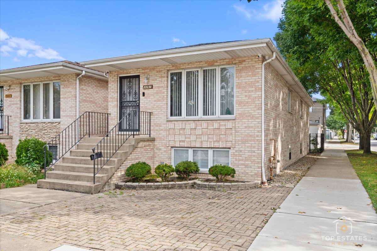 This beautifully updated solid brick home offers incredible space and flexibility with a total of 5 bedrooms and 2.5 bathrooms. The main level features 3 bedrooms, 1.5 bathrooms, and a bright, welcoming kitchen, while the fully finished lower level includes 2 bedrooms, 1 full bathroom, and its own kitchen-perfect for related living. The property has been meticulously maintained inside and out, complete with a 2-car garage. Ideally located just steps from the CTA #62 bus on Archer Ave, and close to Downtown, Chinatown, Target, grocery stores, and McKinley Park, this move-in ready home delivers both convenience and value. Don't miss the opportunity to make it yours!