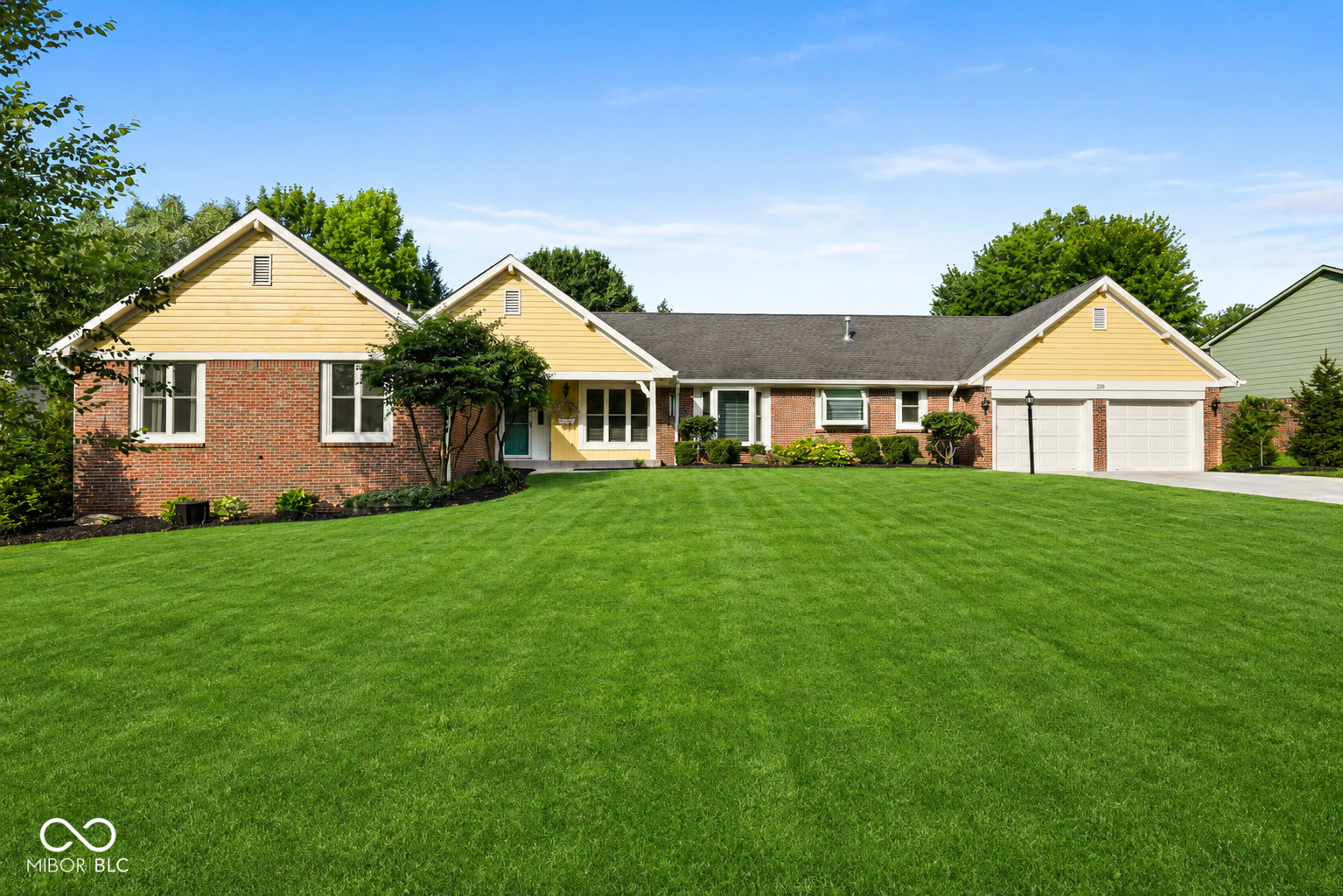 Rare custom ranch in Colony Woods, offering over 3,700 square feet of living space, all bedrooms on the main floor, a finished basement, and a private heated in-ground pool-all surrounded by the mature trees and character of one of Zionsville's established and most desirable neighborhoods.    This home offers something that's hard to recreate: true main-level living with enough space to host, gather, and spread out. Whether it's morning coffee overlooking the backyard, summer afternoons by the pool, or enjoying a refreshing cocktail by the wood-burning fireplace and built-in wet bar after a long day at the office, this home was built for both peaceful everyday living and effortless entertaining.    Move in with confidence knowing the home's biggest improvements have already been completed with quality in mind, including a newer roof, premium windows, updated mechanicals, renovated kitchen and bathrooms, flooring, lighting, trim, and fresh paint throughout. The fully remodeled basement adds even more room for entertaining guests, hobbies, or simply relaxing, plus a huge storage area.    The backyard feels like a private retreat, with a heated, low-maintenance in-ground pool featuring a new liner in 2025, automatic safety pool cover, newer pump and filter, and an app-controlled robotic pool cleaner that stays with the home. A stone patio, landscape lighting, mature trees, and privacy landscaping create a setting that only gets better with time.    The lifestyle extends beyond the property. Enjoy the charm and welcoming atmosphere of Colony Woods with walkability to downtown Zionsville, where restaurants, shops, local events, and the Village vibe are close to home, along with convenient access to top-rated Zionsville schools.    The space of a custom ranch. The character of an established neighborhood. The convenience of meaningful updates already completed. And a Zionsville lifestyle that's difficult to duplicate.