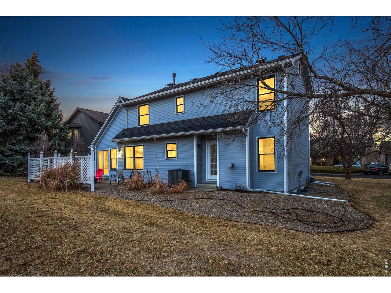 Charming Northwest Loveland home with Victorian-style curb appeal and resort-style neighborhood amenities. Inside, enjoy a spacious, well-lit layout with all new flooring, formal dining or office, and a living room with fireplace. The bright breakfast nook opens to a year-round sunroom. Recent updates include a newer roof and newer appliances. Outdoor spaces feature a welcoming covered front porch and backyard patio. Located in one of Loveland's most desirable neighborhoods with community pool, hot tub, tennis and pickleball courts, park, lake, and scenic trails. Quiet streets and pre-inspected for buyer confidence.
