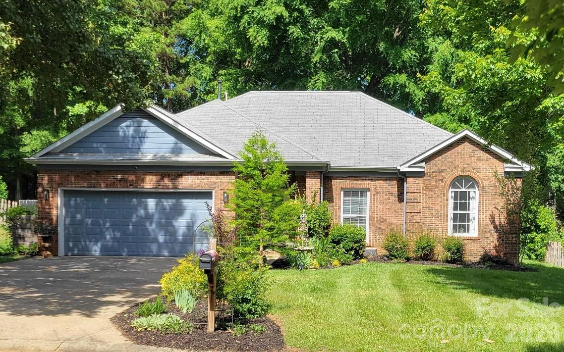 Welcome home to this immaculately maintained, move-in ready 3 bed, 2 bath ranch with a 2-car garage and fenced yard in Bradfield Farms. Thoroughly updated in 2022, this home features fresh exterior paint, a fully renovated kitchen with new cabinets, granite countertops, added pantry, and a large island with seating for 3–4, plus a separate dining area. All appliances convey, including the stackable washer/dryer.Additional updates include new LVP flooring, popcorn ceiling removal, and an opened-up kitchen/living area for a more spacious feel. The primary bath was renovated with a new vanity, tile flooring, separate shower, and soaking tub, while the secondary bath features a new shower, vanity, and flooring. New water heater installed in 2023.Enjoy the gorgeous back deck with new railing overlooking a tree-lined backyard. Neighborhood amenities include two pools, pickleball/tennis courts, and a playground. Conveniently located near I-485 and Sherman Branch Nature Preserve with trails, pathways, and mountain biking.