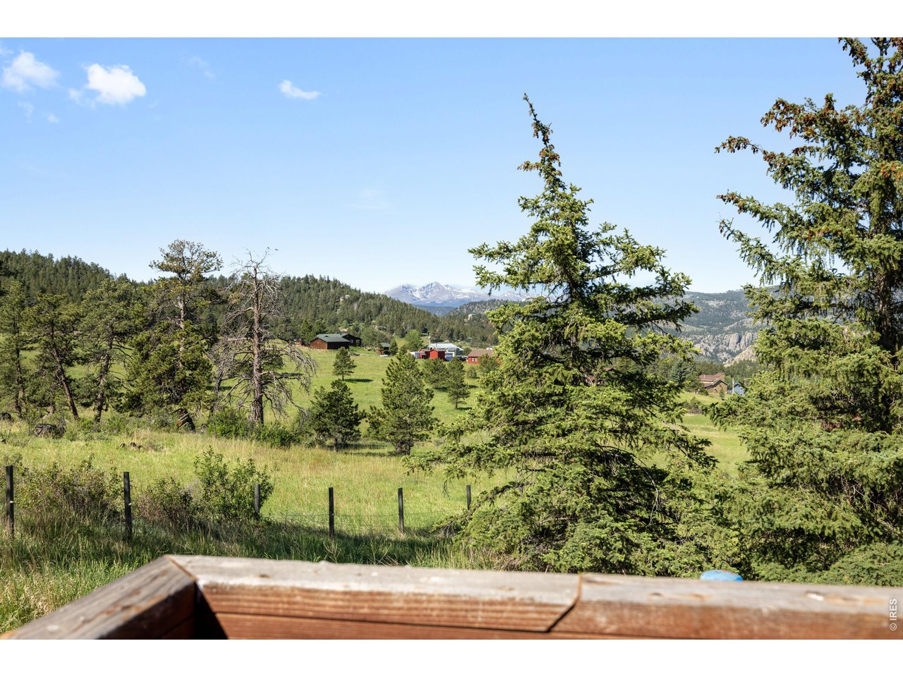 Discover a true Colorado mountain retreat at 678 Palisade Mountain Drive, a one-of-a-kind property where craftsmanship, adventure, and breathtaking scenery come together. Available for the first time in nearly 50 years, this extraordinary home in Cedar Springs Estates began as a seasonal cabin before evolving into a year-round mountain residence designed to celebrate its remarkable surroundings. Hand-scraped Ponderosa Pines harvested locally create stunning posts and beams that extend from the crawlspace through all three levels and into the home's iconic tower, giving the interior a warm, lodge-like atmosphere unlike anything else on the market. Expansive windows frame spectacular mountain views in every direction, including Storm, Palisade, and Crosier Mountains, and even the distant twin peaks of Longs Peak and Mount Meeker. Climb to the tower and take in panoramic 360-degree views that truly make you feel on top of the world. Inside, 2 propane fireplaces provide warmth and ambiance, while the original cabin features an antique wood-burning cookstove, ready to inspire rustic meals and memorable gatherings. Outdoor enthusiasts will feel right at home. The fully fenced property includes a loafing shed for horses, with an additional adjoining acre available for purchase to expand grazing space. Wildlife and birdwatching opportunities abound, and nearby rock faces, canyons, and trails offer endless opportunities for hiking, climbing, and exploring. Enjoy the perfect balance of seclusion and accessibility, with Estes Park and Rocky Mountain National Park just 30 min. away. With lots of storage, you shouldn't need to venture out often but Loveland is approximately 20 mi. to the east for shopping, dining, and everyday conveniences. Properties with this level of character, history, and craftsmanship rarely become available. 678 Palisade Mountain Drive isn't simply a home-it's an opportunity to own a piece of Colorado mountain living that's been cherished for decades.