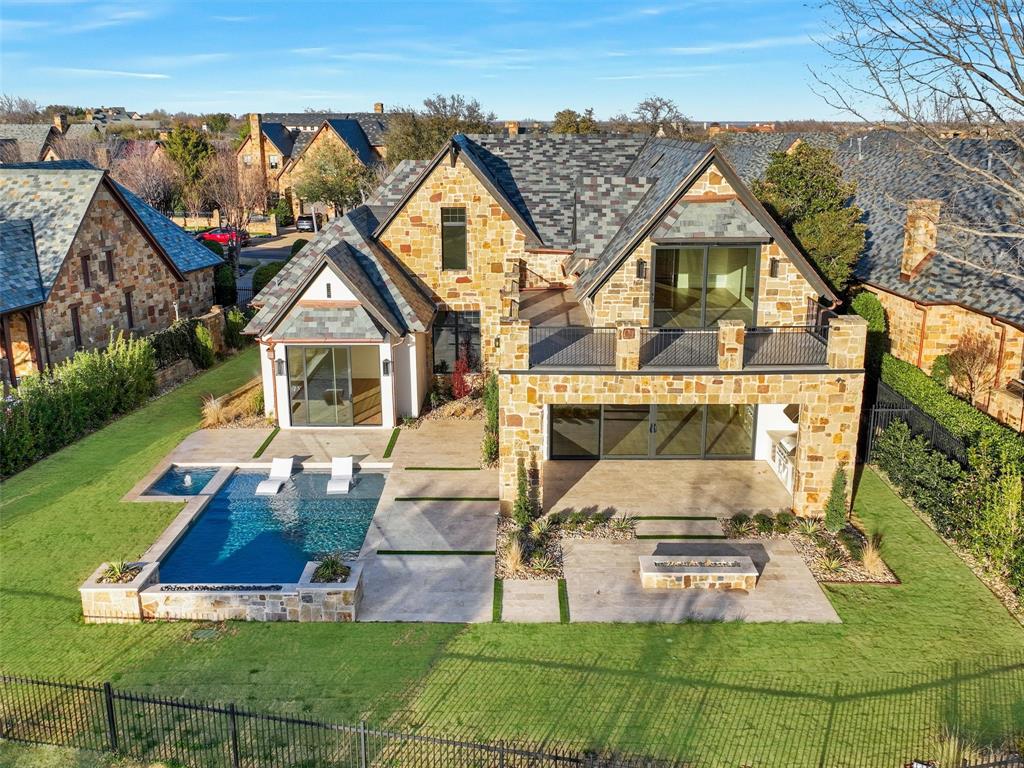 WELCOME HOME to this completely re-imagined, California-inspired Vaquero Villa!!!  Taken down to the studs with wall removed for modern living, this incredible home sits perfectly on the Vaquero Club golf course for picture perfect views and magnificent sunsets!!!!  The entire downstairs has been expanded and re-envisioned for full Open Plan Lifestyle a full wall of sliding glass doors for indoor-outdoor living, contemporary entertaining bar, modern fireplace with fire balls, and impressive wine display feature.  Every surface, walls, insulation, wiring, lighting, flooring, cabinetry, countertops, electronics, etc... all upgraded with the highest quality Designer Luxury Finishes.  Gorgeous Executive Study with a wall of built-ins to display your collectibles. The Great Room is spacious for entertaining and comfortable for evenings at home. The Chef's Kitchen is a dream, with a back Pantry area for easy living. Retire at the end of the day to the peaceful Primary Retreat with serene pool and golf course views, along with a stunning Spa Bath, 2 water closets, dual vanities, electronic shower system and spacious custom closet. Upstairs boasts 3 hotel-like Suites, a Game-Exercise room, and a large Balcony overlooking the incredible backyard and multiple golf course fairways.  Step outdoors to your own Oasis to find a brand new Watercrest pool with tanning ledge, water features, in-ground cleaning system and fire bowls. The backyard is complete with all new landscaping, a rectangular fire pit, covered patio with automated screens, outdoor Kitchen-Grill area + AMAZING VIEWS!  This home potentially offers Priority Status for a Vaquero Golf Membership! (Buyer must complete membership process and pay all Club fees.)