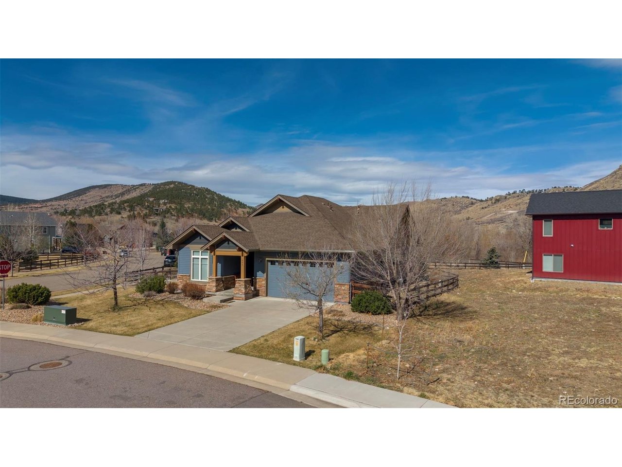 Enjoy effortless main-level living in this thoughtfully designed ranch-style home, ideally situated on a corner lot in the sought-after Lyons Valley Park neighborhood. A welcoming covered front porch sets the tone, leading into a bright, open-concept floor plan highlighted by vaulted ceilings and abundant natural light. The well-appointed kitchen features warm maple cabinetry, slab granite countertops, stainless steel appliances, a gas range, and an oversized island-perfect for gathering and entertaining. It flows seamlessly into the spacious living and dining areas, complete with a cozy gas fireplace and custom built-ins. The main level offers two bedrooms, including a generous primary suite with vaulted ceilings, a luxurious five-piece bath, and a large walk-in closet. A versatile office or flex space with French doors provides the ideal setting for working from home or accommodating guests, while a convenient main-level laundry room adds to the home's functionality. Step outside to a large backyard and patio perfect for outdoor enjoyment, or furry friends. The full, unfinished basement presents endless possibilities for expansion, recreation, or additional storage. Perfectly located, Lyons Valley Park offers easy access to neighborhood parks, ponds, a dog park, scenic trails, the St. Vrain River, and local schools. Just minutes away, the charming Town of Lyons invites you to explore its unique shops, restaurants, and vibrant summer music festivals. Love Where You Live!