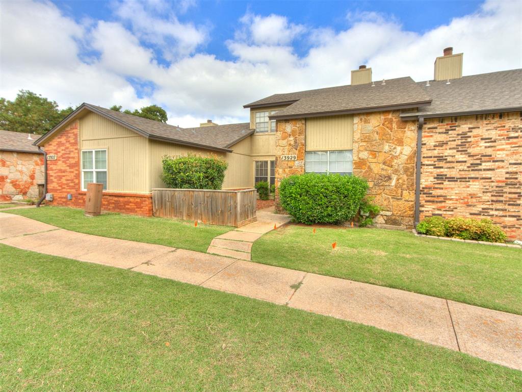 Welcome to this charming 2-bedroom, 2-bathroom townhouse in The Crossings, located within Edmond Schools. This home combines style, comfort, and convenience, complete with a detached 2-car garage and additional overflow parking.

Step inside to find wood-look tile floors throughout the first level, creating a warm and modern feel. The spacious living room features a two-story vaulted ceiling, a stunning stone fireplace with hearth, and is open to the dining area—perfect for entertaining. The kitchen is well-appointed with granite countertops, tile backsplash, an undermount sink, breakfast bar, and included appliances (range, refrigerator, and dishwasher). A laundry hookup is also conveniently located inside the townhome.

The first-floor bedroom is generously sized with vaulted ceiling, a large walk-in closet, and a private bathroom updated with granite counters and a stylish glass bowl sink. Upstairs, you’ll find an additional oversized bedroom with its own walk-in closet and private bath, also featuring granite counters and a glass bowl sink.

Step outside to a private backyard with fenced sides and conveniently located directly across from the community amenities The Crossings has to offer, including a pool, clubhouse, basketball court, tennis court, playground, and park. Perfectly located just off Memorial Road, this home is minutes from Chisholm Creek, Quail Springs Mall, restaurants, and shopping.

Experience the ease and convenience of townhome living while still enjoying plenty of space and community features. Welcome Home!