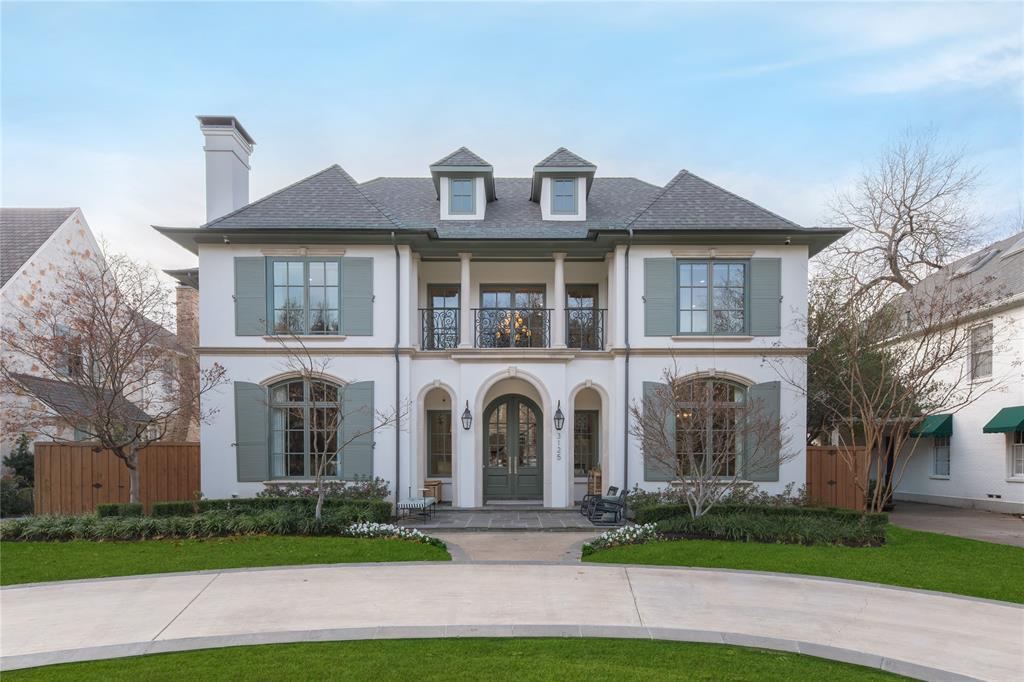 Located in the heart of University Park, this exceptional 6,327-square-foot residence is a true designer’s dream—originally built by renowned luxury builder Todd James, with interiors by Fort Design Studio, and thoughtfully elevated through over $1M in renovations completed in 2023. Showcasing impeccable, high-end designer finishes throughout, every space has been curated with intention and sophistication. Situated on a rare 70x160 lot, the home offers 5 bedrooms, 5.2 baths, including four spacious ensuite bedrooms on the second level, and a private third-floor guest retreat or fifth bedroom with added square footage and a full bath. Designed for both everyday living and elevated entertaining, the home features all primary living spaces on the first floor, complemented by a seamless and highly functional floor plan. Highlights include two private offices, dual staircases, a full-size home gym, Savant smart home automation, a chef’s kitchen with banquet seating, wine cellar and bar, and multiple light-filled living areas. The luxurious primary suite offers a private sitting room and separate closets, creating a true retreat within the home. Recent improvements include a new roof, HVAC systems, water heaters, gutter system, sprinkler system, refurbished and painted stucco exterior, and the addition of a circular drive and electric vehicle charging station. Electric shades are installed throughout the home, along with Phantom Screens enhancing the covered patio experience. Outdoor living is equally impressive, featuring a resort-style pool and temperature-controlled spa, beautifully refreshed mature landscaping, and thoughtfully designed spaces that maximize seamless indoor–outdoor entertaining on this oversized lot.