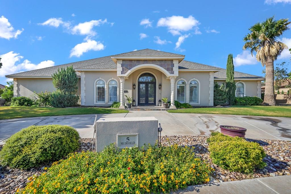 Stunning 4 bedroom, 3.5 bath in gated community.  2 living areas.  Spacious living area, open concept.  Sequestered main suite, huge walk in shower, bathtub, dual sinks and closets.  Backyard is perfect for entertaining with covered patio/fireplace, enclosed outdoor kitchenwith a stone pizza oven, grill and refrigerator.  Call today.