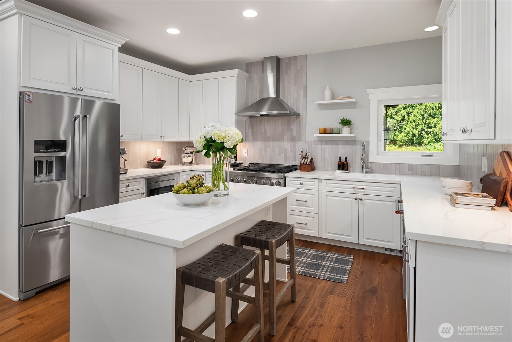 The heart of the home—a beautifully updated kitchen designed for entertaining, family gatherings, and effortless everyday living.