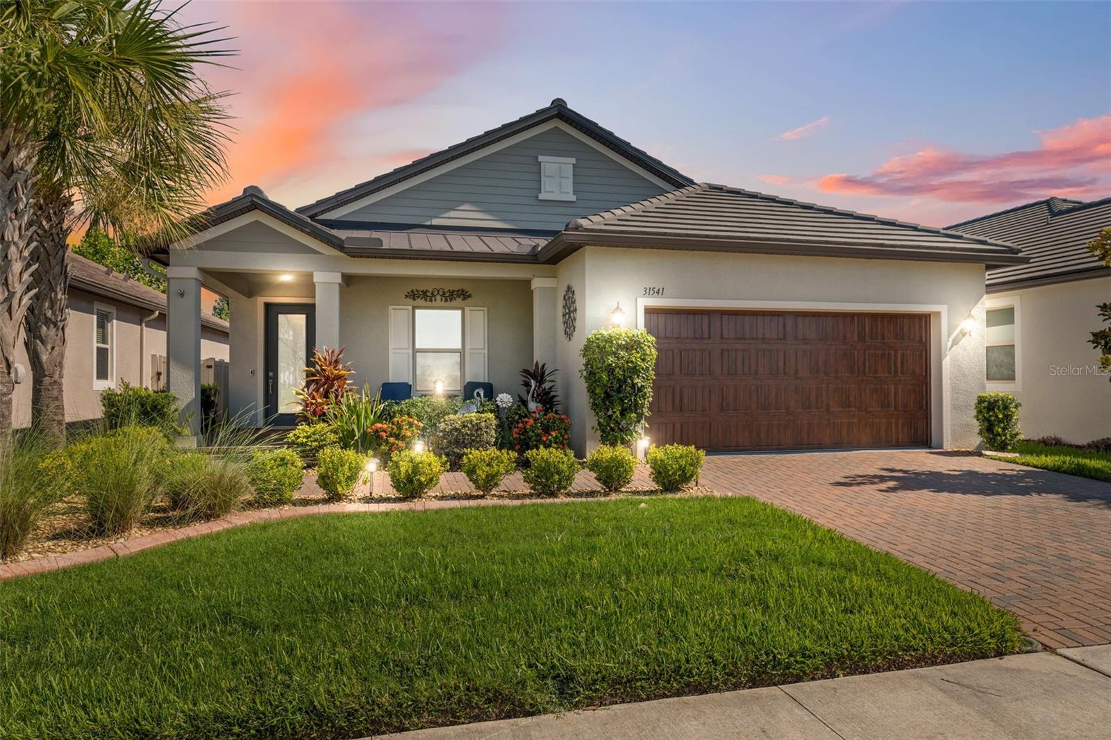 Welcome to your Dream Home in the popular Mirada Lagoon Community. Located in the Medley 55+  neighborhood which offers almost countless activities and amenities. This stunning 2 bed 2 bath + flex room home is very spacious and has an awesome open floor plan. This single story 1770 Sqft is full of upgrades noticeable from second you pull up . The perfectly manicured yard with curbing on flower beds. Also, the mulch has been replaced to rock for a better look and better drainage. The front door has been upgraded to a gorgeous glass insert. upon entering you notice the upgraded Luxury Vinal floors through the majority of house. This was not original but was a massive upgrade by homeowner. You will notice the crown molding through out ,plus great chandeliers and oversized fan. When entering the kitchen you will see beautiful stainless appliances , quartz countertop with a back splash that ties the room together. Fans in all bedrooms and flex space. Master bedroom is very spacious with plenty of light. Master bath has quartz countertops with Jack and Jill sinks. Stunning ceramic tile stand up shower with a corner bench. The real treat is the giant back yard 33 x22 patio. 10 x 18 enclosed under roof . A great place for a party!!! Garage is 20 x20 plus has a *8 x 9 work shop or golf cart area .Mirada is a golf cart community.
     Medley at Mirada is a Resort Style * no maintenance living in the exclusive 55+ gated community featuring private amenities . The  community features beautiful Clubhouse, restaurant/ bar, 24 7 fitness center, large pool with lap area , pickle ball courts , tennis courts ,dog park , indoor dog wash station billiards and more. Events offers Zumba, water aerobics. Mahjong, Tai Ch i, and assorted card games. Also has a large banquet hall for events like concerts etc.
     The Mirada community has Florida's Largest Man Made Lagoon " 15 acres ".Community residents have access to lagoon at no charge and get 25 guess passes and really reduce prices on additional passes and upgrades. The lagoon does a monthly calendar. it does concerts , bingo, trivia night, movie night and much more. Many residents enjoy the swim up bar , restaurants , or just relaxing. Include with your HOA fee you get private landscaping ,exterior maintenance , high speed internet and expansive cable package.
CDD is included in your property tax amount.
