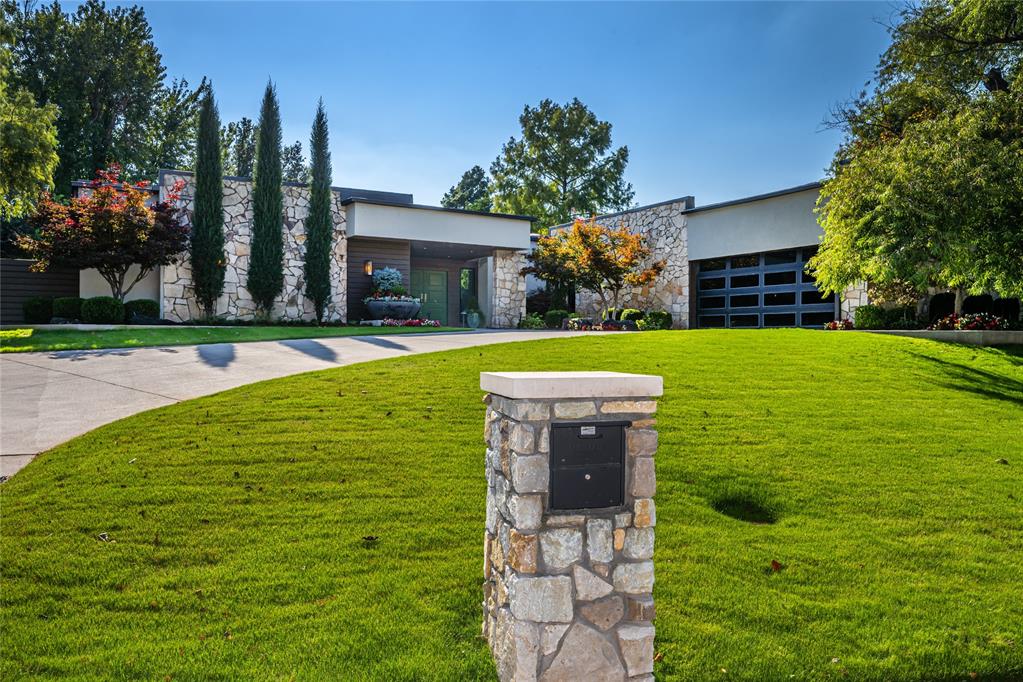 Absolutely Stunning Mid-Century Modern Masterpiece — Fully Renovated to the Studs!
Step inside and be captivated by the expansive wall of windows offering a breathtaking view of the sparkling pool. This meticulously updated home blends iconic Mid-Century Modern design with today’s luxury finishes. Seamless hardwood floors flow throughout the home, paired with high-end light fixtures, premium hardware, and exquisite landscaping that set this property apart. The chef’s kitchen is a showstopper — equipped with top-of-the-line JennAir stainless steel appliances,  6-burner gas range w/double ovens, counter-depth refrigerator, ice maker & pantry. Gorgeous leathered granite countertops, soft-close drawers & cabinetry make this kitchen as functional as it is beautiful. Enjoy 2 utility areas — one conveniently located in the primary suite & another in the hall.  The primary bedroom is a true retreat w/2 walk-in closets, wood floors, built-in speakers, and a mounted TV. The luxurious primary bath features heated floors, a freestanding soaking tub, oversized shower, and elegant marble countertops w/dual sinks. The spacious main living area boasts a fireplace with gas logs, custom built-ins, wood flooring & speakers. A second living area is currently a cozy sitting area but can easily function as a formal dining. The third living space offers flexibility as a home office, den, or media room, complete with a skylight, TV, speakers, and hardwood flooring. Additional features include: Half bath, 3 guest beds & spacious hall bath w/heated floors, oversized shower, and skylight. Private backyard oasis with firepit, generous patio space, and serene landscaping — perfect for morning coffee or evening gatherings. Extras that stay with the home: All mounted TVs, 2 washer/dryer sets, 8 outdoor cameras, outdoor pots, and a whole-house Generac generator. This home is truly magazine-worthy — a rare and remarkable opportunity for anyone seeking a show-stopping Mid-Century Modern gem.
