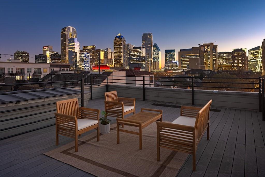 Tucked away on a quiet cul-de-sac in the heart of State Thomas, 2224 Worthington delivers that rare mix Dallas buyers actually want: peaceful neighborhood energy with truly walkable access to everything Uptown has to offer. Spanning 3,579 square feet across four interior levels—plus a fifth-level rooftop deck—this townhome lives tall, bright, and beautifully updated, with a private elevator connecting each floor.Step inside to soaring 10’ and 11’ ceilings, fresh paint, and newly installed hardwoods that set a crisp, classic tone. The first level is ideal for guests or multi-purpose living, featuring a bedroom and a dedicated study. Upstairs, the second level is designed for everyday life and easy entertaining: an open kitchen with updated countertops and backsplash, a true dining room, and a separate laundry room—because laundry shouldn’t be part of your kitchen décor.The third level is reserved for the primary suite, a true retreat with a fireplace, generous proportions, and an oversized walk-in closet. The fourth level is where the fun lives: a game room and entertaining area that makes hosting effortless, whether it’s game day, cocktails, or a cozy movie night and an additional bedroom.And then there’s the showstopper: the fifth-level rooftop deck overlooking downtown Dallas—an unbeatable perch for sunsets, fireworks, and the kind of city views that remind you why you love living here.