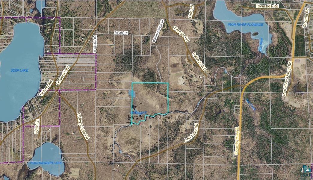 Discover a rare Northwoods property offering approximately 1,650 feet of Iron River frontage, just minutes from Iron River, WI. Whether you’re searching for exceptional hunting land, a recreational retreat, or a future home or cabin site, this 39.5-acre parcel offers an outstanding combination of woods, water, wildlife, and year-round recreation. About five acres of high ground and a scenic bluff provide an attractive, private building site while preserving the surrounding property's natural beauty. The diverse woodland includes mature birch, oak, maple, ash, white pine, red pine, and spruce. Wildlife is abundant, with whitetail deer, turkey, grouse, ducks, and other native species frequently found throughout the acreage. The Class A Iron River is known for brook and brown trout fishing and also provides a peaceful setting for canoeing and kayaking. Spend evenings around the campfire beneath the stars and wake to quiet mornings surrounded by the sights and sounds of the Northwoods. In winter, nearby snowmobile and ATV/UTV trails provide access to miles of recreational riding. The property is also conveniently located near Lake Superior, Quarry Beach, Big Pete Beach, Twin Falls Park, the Port Wing Boreal Forest, trout streams, and miles of maintained recreational trails. Whether you plan to hunt, fish, paddle, hike, ride, build, or simply enjoy the privacy of Northern Wisconsin, this property offers exceptional recreational potential. Bayfield Electric service is available to the property.