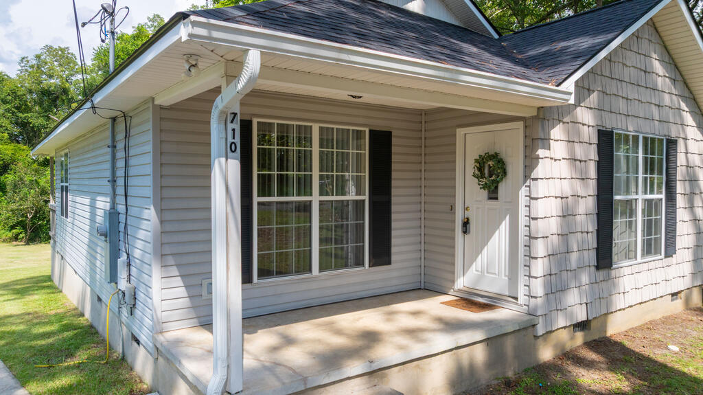 Welcome home to this inviting 2-bedroom, 1.5-bath home offering 1,034 square feet of comfortable living space! Inside, you'll find an open-concept layout that brings together the kitchen, dining, and living areas, creating a functional space for everyday living and entertaining. The home also features a dedicated laundry room for added convenience. Outside, a covered front porch, and covered back porch provides welcoming places to relax. The roof was just replaced, offering an important recent update and added peace of mind. This well-designed home is ready for its next owner!