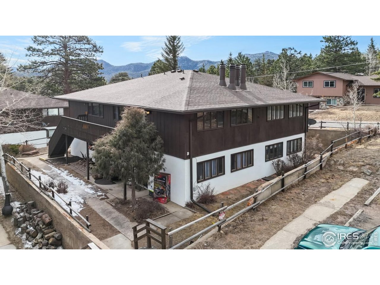 Welcome to easy mountain living at 603 Aspen Ave, Unit B4. This beautifully updated condo sits right in the heart of Estes Park and offers 2 spacious bedrooms and 1 bathroom with an open, light-filled layout and modern finishes throughout. The kitchen features stainless steel appliances and plenty of cabinet space, while the cozy living room with its fireplace creates the perfect spot to unwind after a day in the mountains. The primary bedroom provides generous space with two closets, and the second bedroom is ideal for guests or a home office. Move right in and start enjoying the Estes Park lifestyle. Schedule your private showing today!
