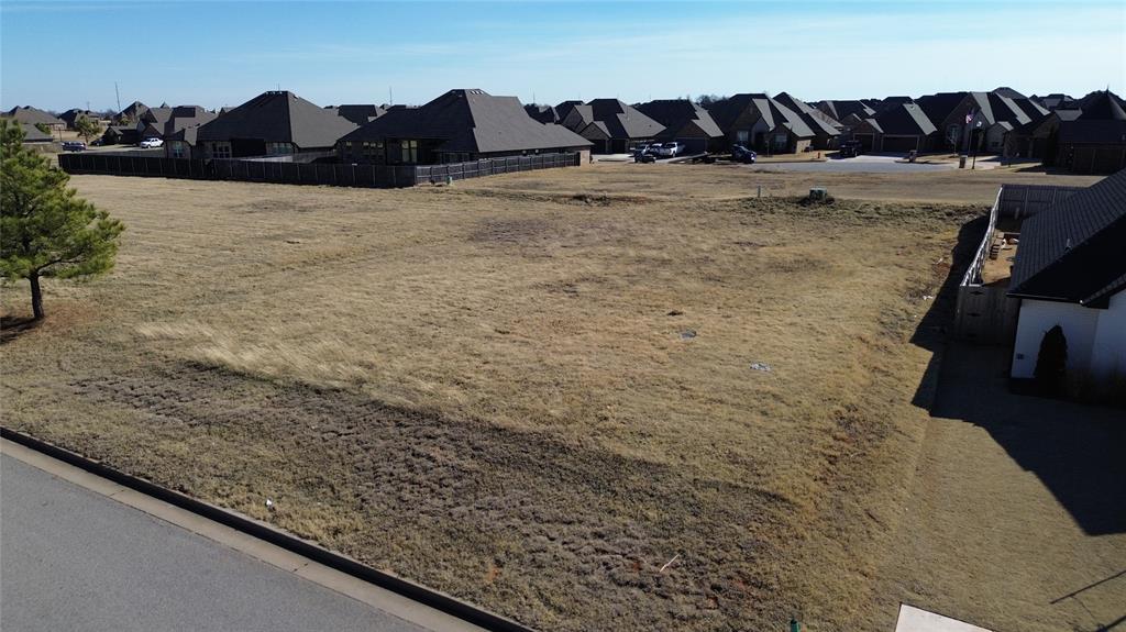 Very nice residential lot in the beautiful and luxurious Mustang Creek. Mustang School District, this community is convenient to all your family's favorite spots, including downtown, the airport, shopping, lakes and parks! Community Amenities include; Park, Pond Playground/Soccer ground Street Lights Sidewalks. 2900 sqft min. Flat and rectangular nice lot for a for a nice luxurious home.