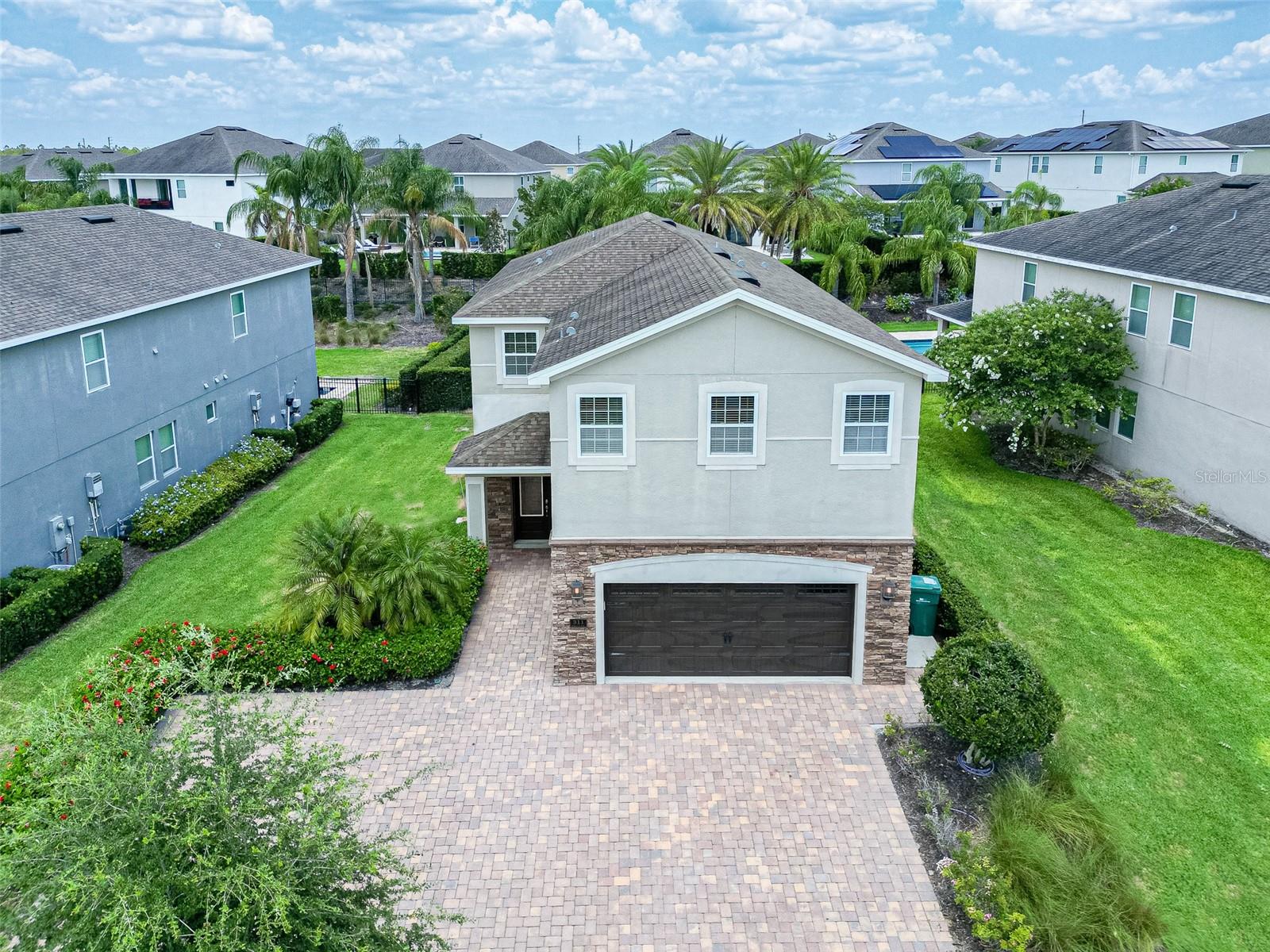 SIGNIFICANT PRICE REDUCTION *****Nestled in Kissimmee, Florida, at 311 Falls Dr, this exquisite two-story home built in 2017 features 6 bedrooms and 7 bathrooms within its 3,099 sq ft. Situated on a 9,804 sq ft lot in Reunion West, it boasts a modern kitchen with quartz countertops, a first-floor master suite, and a private heated pool and spa. Residents enjoy access to the Encore clubhouse resort amenities and the convenience of a 2-car garage. Offered furnished and in excellent condition, this property is an ideal residence or investment opportunity.