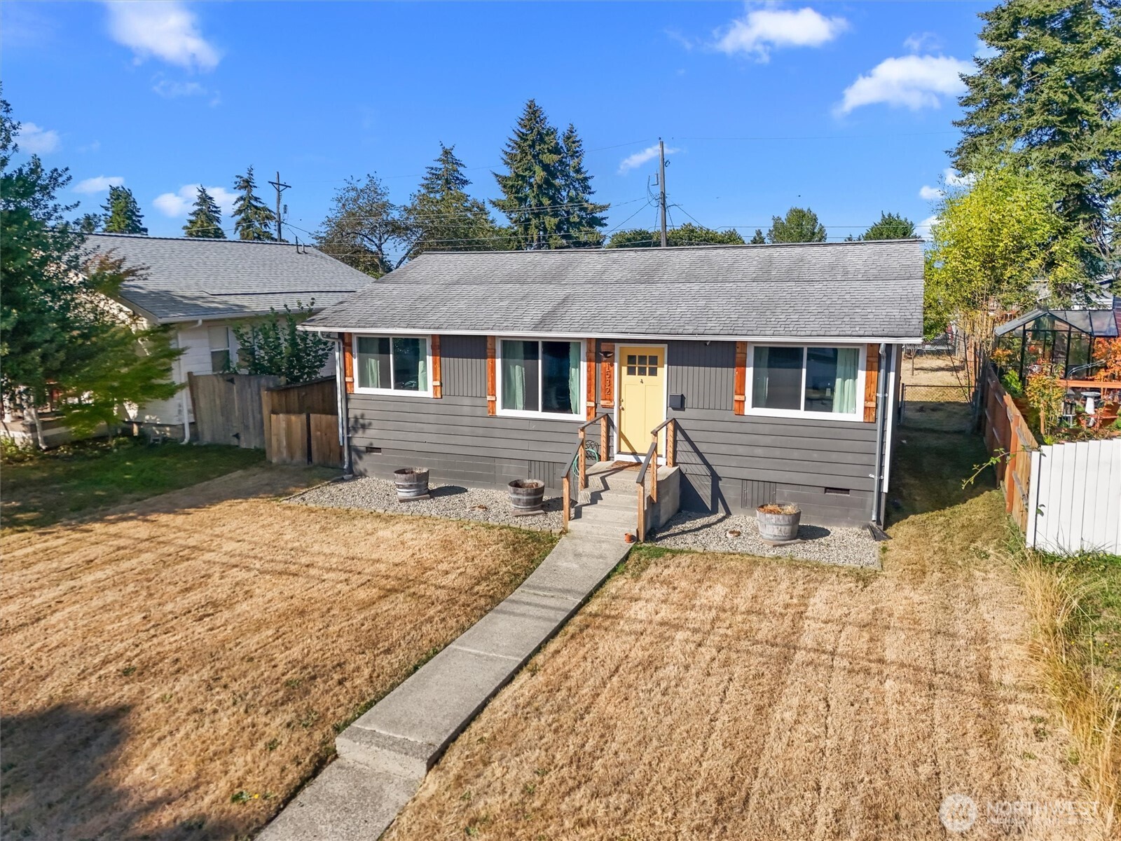 Affordable & move in ready! 4 Bedroom home in Central Tacoma close to shopping and downtown in a Great Neighborhood! The kitchen has beautiful Quartz Counter-tops, shaker cabinets, subway tile-backsplash, floating shelves, and stainless appliances. Rustic wood accents provide a warm and cozy atmosphere. Amazingly fenced backyard and large detached garage/shop! Don't miss this amazing home! Perfect starter home or downsizer. Hard to find a 4 bdrm that has been remodeled in this price range. Move in and enjoy. Won't last long. Schedule your tour today before its gone.