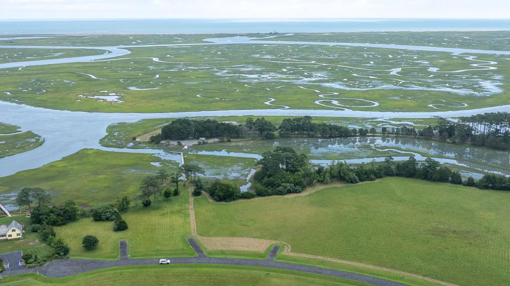 Come see this picturesque setting on Folly Creek in the private and exclusive Seaview Community.  Located on the "Seaside" on the Eastern Shore of Virginia, make plans to build your dream home on the 3.5 (+) acres with the convenience of being close to the shops and restaurants in the historic bayside town of Onancock, only 10 minutes away.  The Barrier Island beaches are easily accessible by boat from the property or from the community dock- which is available to all property owners. Lot 27 has its own dock built.  Some repairs are needed, but permits for repairs are typically easy and seamless.  Call today to schedule an appointment to be instantly transported to this dream property.