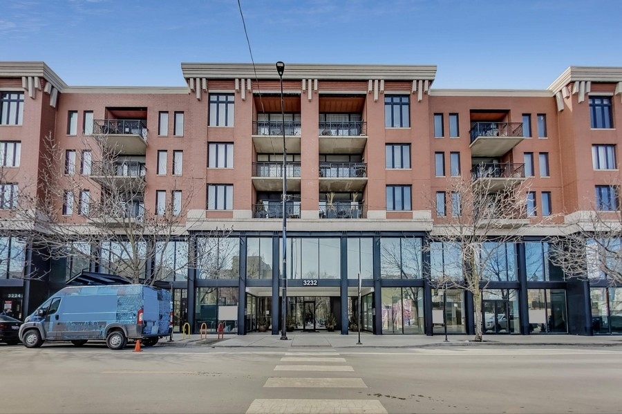 EAST LAKEVIEW - PLAZA32 - PRIME LOCATION - unit does not face Halsted.   Rarely available, spacious 2-bedroom, 2-bath corner home with a West facing balcony and heated garage parking included in a boutique elevator building with 24-hour door staff.  Split floorplan with spectacular sunsets from the North and West views.  Open living room/dining/kitchen combination, flooded with natural sunlight. The kitchen features newer stainless-steel appliances, 42" cabinetry, and granite counters.  The primary suite features a walk-in closet, double bowl sinks, soaking tub, and a stand-up shower.  Hardwood floors throughout the living area.  Central heat and air.  Gas fireplace.  Full size washer/dryer in unit.   Storage cage included.    Recent updates:   New garbage disposal - 2023, Primary bath - new mirrors and vanity lighting  and shower hardware -2024, 2nd bath vanity lighting updated 2024, New Cafe Microwave with air fryer + convection bake- 2024, New balcony sliding doors - 2024, New Whirlpool dishwasher  -2024, new bathroom vent fan motors and fixtures - 2022, Entire unit walls, doors, trim, and ceiling painted - 2022, Cabinetry painted + new hardware - 2022, new Carpet in both bedrooms - 2023.  The building has a beautiful large common landscaped park. Assessments include nearly everything: All gas (heat & cooking), water (hot & cold), RCN Digital TV with HBO, SHOWTIME, & two TIVO HD DVRs, and high-speed internet/Wi-Fi included!!   Dog and cat friendly, building has a private dog run/park. Close to the lakefront, Target, Whole Foods, Mariano's, CTA-Belmont stop, Starbucks, shopping, & restaurants.   Extremely well-managed building.