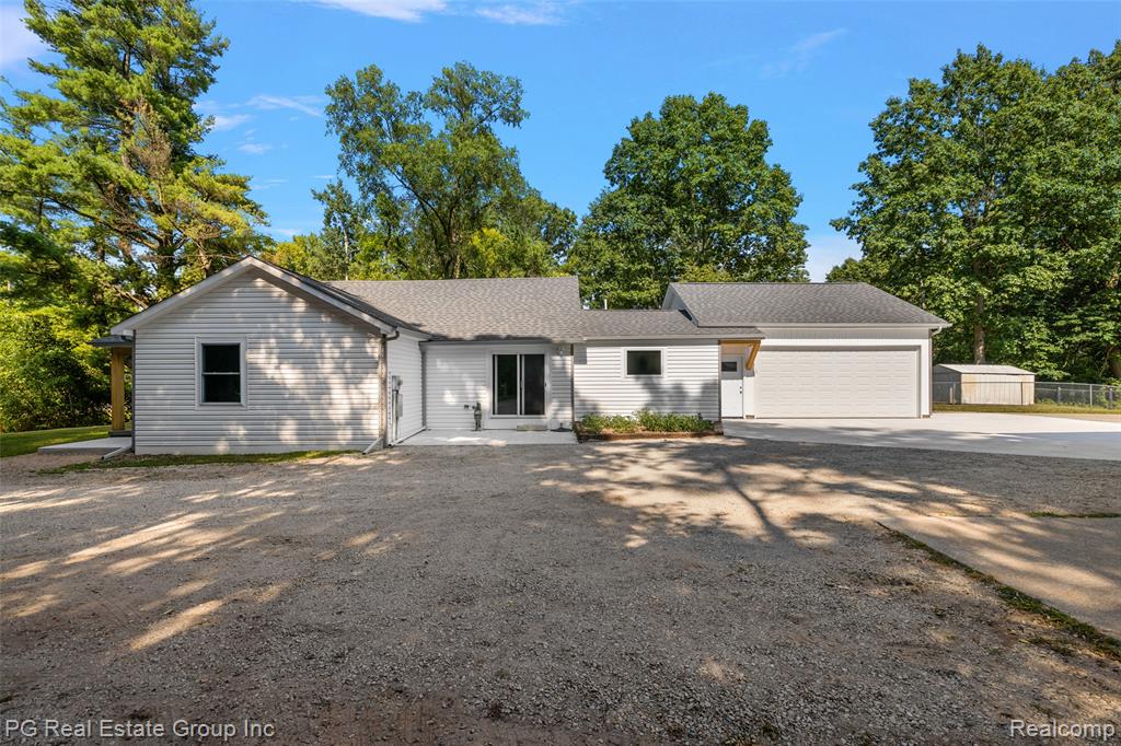 Rarely Available – Fully Renovated Bungalow on 10 Acres in St. Clair

Discover a perfect blend of modern luxury and country tranquility at 5771 Gratiot. Set on 10 wooded acres, this 4-bed, 2-bath home offers 1,600+ sq ft of open-concept living, completely renovated in 2025. A charming covered front porch welcomes you inside to rich hickory hardwood floors, LED lighting, and a spacious living room flowing into the dining area with outdoor access.

The chef’s kitchen boasts quartz countertops, full-height tile backsplash, modern cabinetry, and gas/electric hookups. The massive primary suite features a walk-in closet and spa-inspired bath with an oversized shower. Three additional large bedrooms share a stylish full bath with a tub/shower combo. The huge laundry room is ready for gas or electric appliances. Upstairs, a versatile bonus room awaits—perfect for an extra bedroom, lounge, or storage.

Enjoy a newly built 2&#189;-car attached garage plus a 52x20 pole barn with 15’ ceilings, 220 electric, LED lighting, and five insulated overhead doors. The fenced backyard includes a dog house and storage shed—ideal for pets and play.

Every detail is new: garage, roof, windows, AC, furnace, plumbing, electrical, hot water tank, septic tank & field, kitchen, baths, doors, and flooring. A fruit cellar (Michigan basement) adds character and storage.

This turn-key retreat offers unmatched privacy while being minutes from town—ready for your next chapter.
