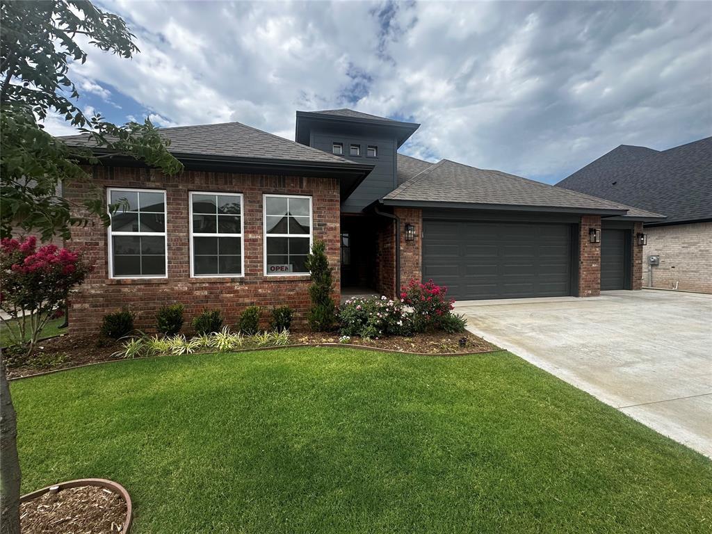 Welcome to your brand-new dream home in the highly sought-after Bridge Creek School District! Offering 2,175 square feet of thoughtfully designed living space, this beautifully crafted home blends modern style, everyday comfort, and exceptional functionality.Step inside to discover an open, light-filled living room where walls of windows invite natural light to pour inside, creating a warm and welcoming atmosphere you'll love coming home to. The open-concept design flows effortlessly into the dining area and kitchen, making it the perfect space for entertaining guests, celebrating holidays, or simply enjoying everyday life.A dedicated study offers the flexibility today's homeowners need, whether you're working from home, creating a quiet reading room, or designing the perfect hobby space. Designer touches are found throughout the home, including upgraded designer doors at the study and a beautiful barn door leading to the pantry, adding character and style to an already impressive floor plan.The kitchen is truly the heart of the home, featuring abundant cabinetry, generous countertop space, and a layout that keeps everyone connected. Whether you're preparing a quick breakfast before school or hosting friends for the big game, this space is designed to bring people together.An oversized laundry room makes everyday chores a little easier while providing additional storage, and the spacious 3-car garage offers plenty of room for vehicles, tools, recreational equipment, and all the extras that come with an active lifestyle.Start your mornings with coffee on the welcoming covered front porch and end your evenings relaxing on the covered back patio, where you'll have the perfect setting for grilling, entertaining, or simply enjoying Oklahoma's beautiful sunsets.Built with quality craftsmanship and timeless design, this home offers the modern finishes, thoughtful details, and functional layout you have been are searching for.
