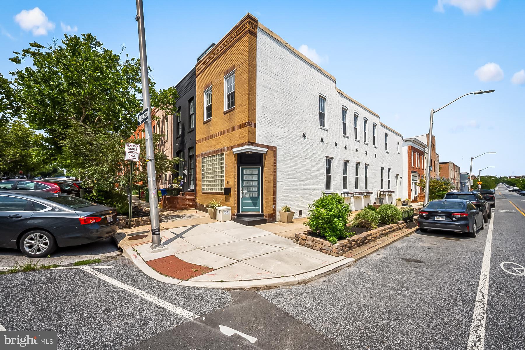 Architecturally distinctive and rich in Baltimore history, this exceptional 16-foot-wide end-of-groupresidence offers a rare combination of industrial-inspired design, modern comfort, and anunparalleled Canton location. Originally home to Joe Poodle's Pool Hall and Boxing Gym, whereboxing legend Sugar Ray Leonard once trained upstairs, the property carries a fascinating legacythat is as memorable as the home itself.Bathed in natural light from 18 windows with coveted southern and eastern exposures, the interioris defined by soaring 14-foot ceilings, exposed brick, beams and ductwork, Brazilian fruitwoodflooring, thoughtfully curated lighting, and a dramatic floating staircase. Designed with entertainingin mind, the chef's kitchen is anchored by an impressive 22-foot granite island, high-end stainlesssteel appliances, and generous gathering space. Recently painted throughout with beautifullyrefinished Brazilian fruitwood floors, the home is move-in ready while preserving its distinctivearchitectural character.The versatile main level offers the flexibility of a bedroom, home office, or den, along with a powderroom, laundry area, and private secondary entrance. Upstairs, an expansive loft-style family roomseparates two spacious ensuite bedrooms, including a stunning primary retreat with vaultedceilings and an oversized Italian-tiled walk-in shower.Meticulously maintained, the home is served by a two-zone commercial-grade HVAC system.Perfectly positioned directly across from Canton Crossing and just moments from the waterfrontpromenade, Patterson Park, Canton Square, and the shops and restaurants of Fells Point, thelocation offers the very best of city living. Ample street parking is available, with nearby garageparking available for lease.A remarkable blend of history, architecture, and contemporary lifestyle, this is a residence unlikeany other in Canton.