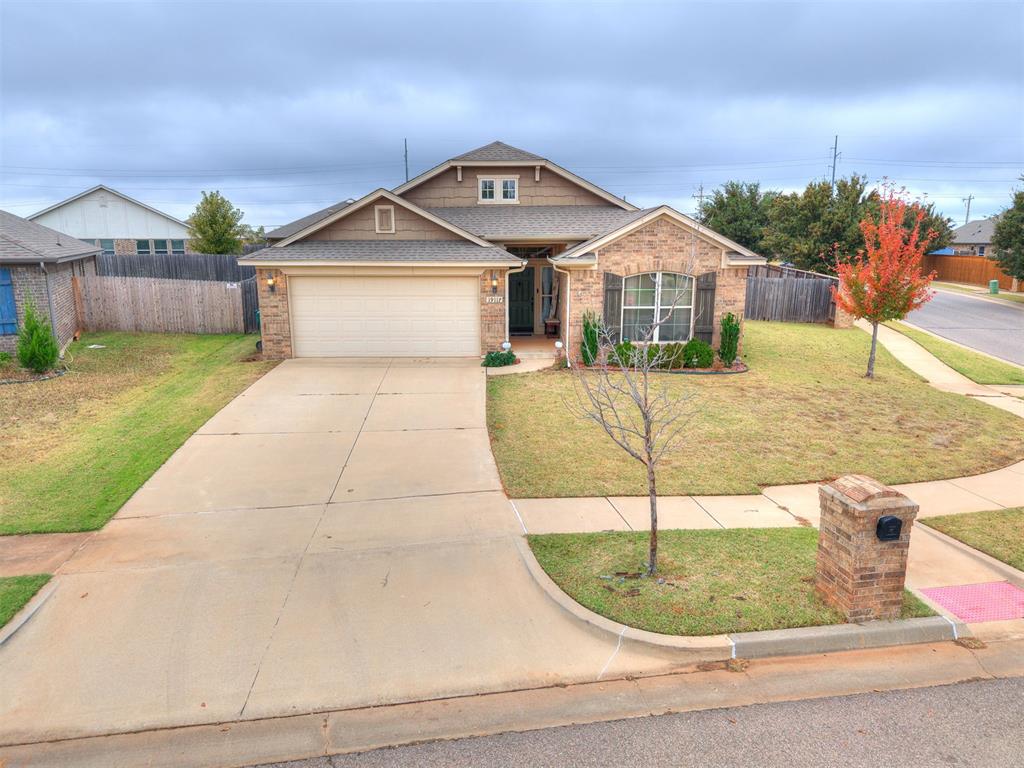 Tucked away in the interiors of Valencia sits 19117 Hecho DR, Edmond, OK 73012, located in convenient Edmond location with Deer Creek Schools, shopping, and dining close by! This home was built in 2016, and has all the modern touches you'd expect, with a dash of that classic charm we all adore. Nice architectural elements and archs, as well as SOLID surface floors throughout, great if you suffer allergies, or have furry friends! Large living area with lots of space, as well as a separate living/study area as well. The eat in kitchen features a breakfast bar island as well and lots of cabinetry.  Three spacious bedrooms, each a blank canvas ready for your personal touch. The two full bathrooms with primary bath featuring double vanities, separate garden tub and shower. With two garage spaces, you'll have plenty of room for your vehicles, your hobbies, or extra storage. This Edmond residence is more than just a house; it is your chance to embrace the lifestyle you've always imagined. With a spacious yard, covered patio, protected entry way and more!  Can accomodate a quick close to get you in for the holidays!!