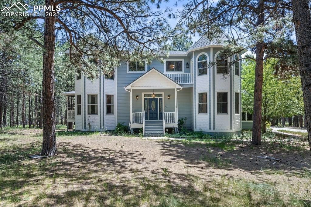 Prepare to be amazed.  Serene, recently remoded 5,000 square foot beauty, comfortably nestled on 5+ treed acres with zoning for horses/animals.
With 5 bedrooms, and 4 baths, and over 4,800 finished elegance, you won't be lacking for efficiency and comfort.  Bring the toys, and the RV.  There's room for all.  Or just enjoy your favorite wine on decks all around; listening to the soft evening winds rustling through the pines.  Maybe just comfortably lounging in front of one of the three fireplaces(one is wood burning)?  This home is the complete balance between stunning opulence, and serenity. Many upgrades which must be seen to completely understand and appreciate, including a walk out to very manageable acreage which is fully fenced.  Home is priced to account for outside deferred maintenance.

  Note:: this is a short sale